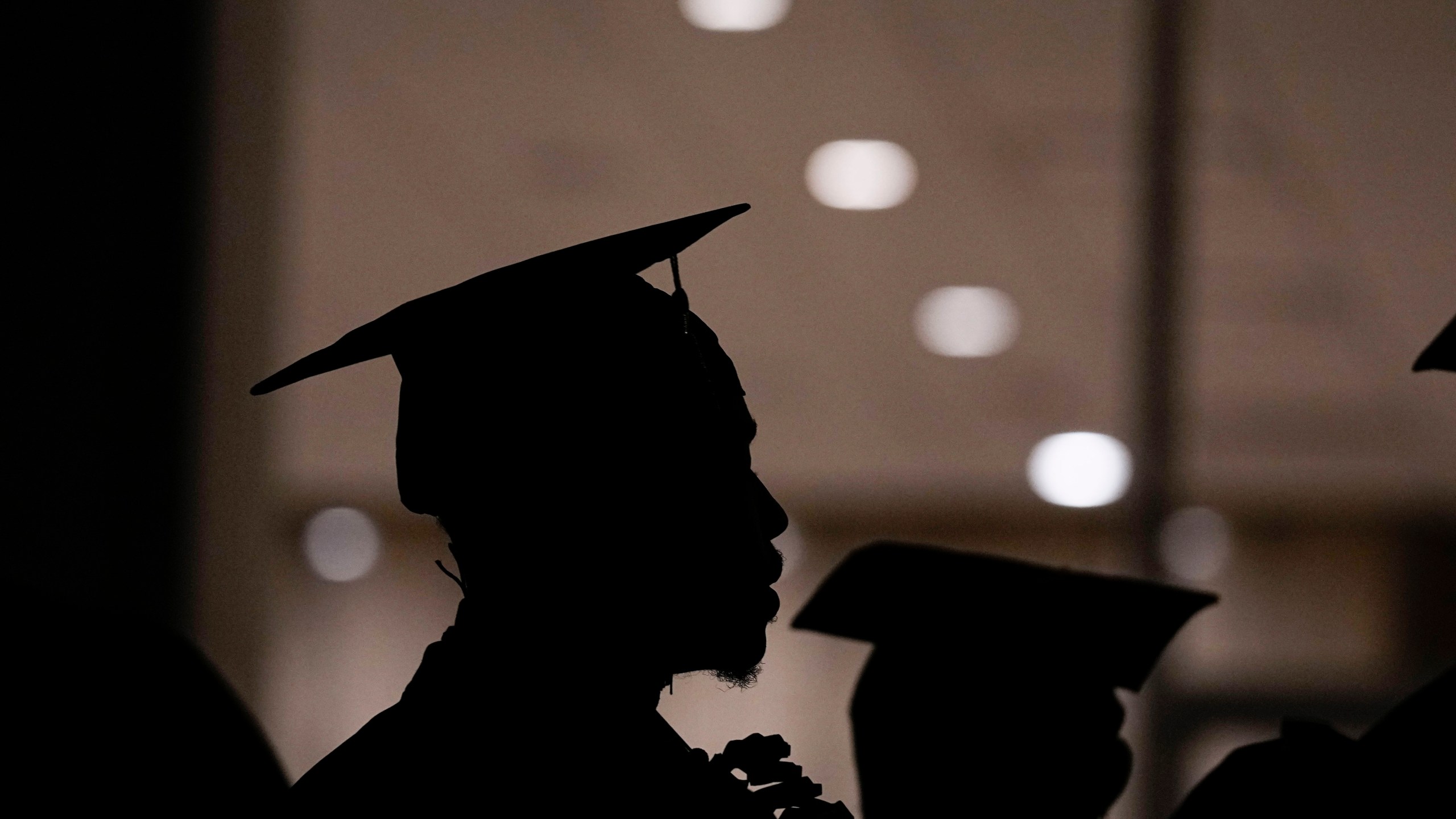 College grad in profile