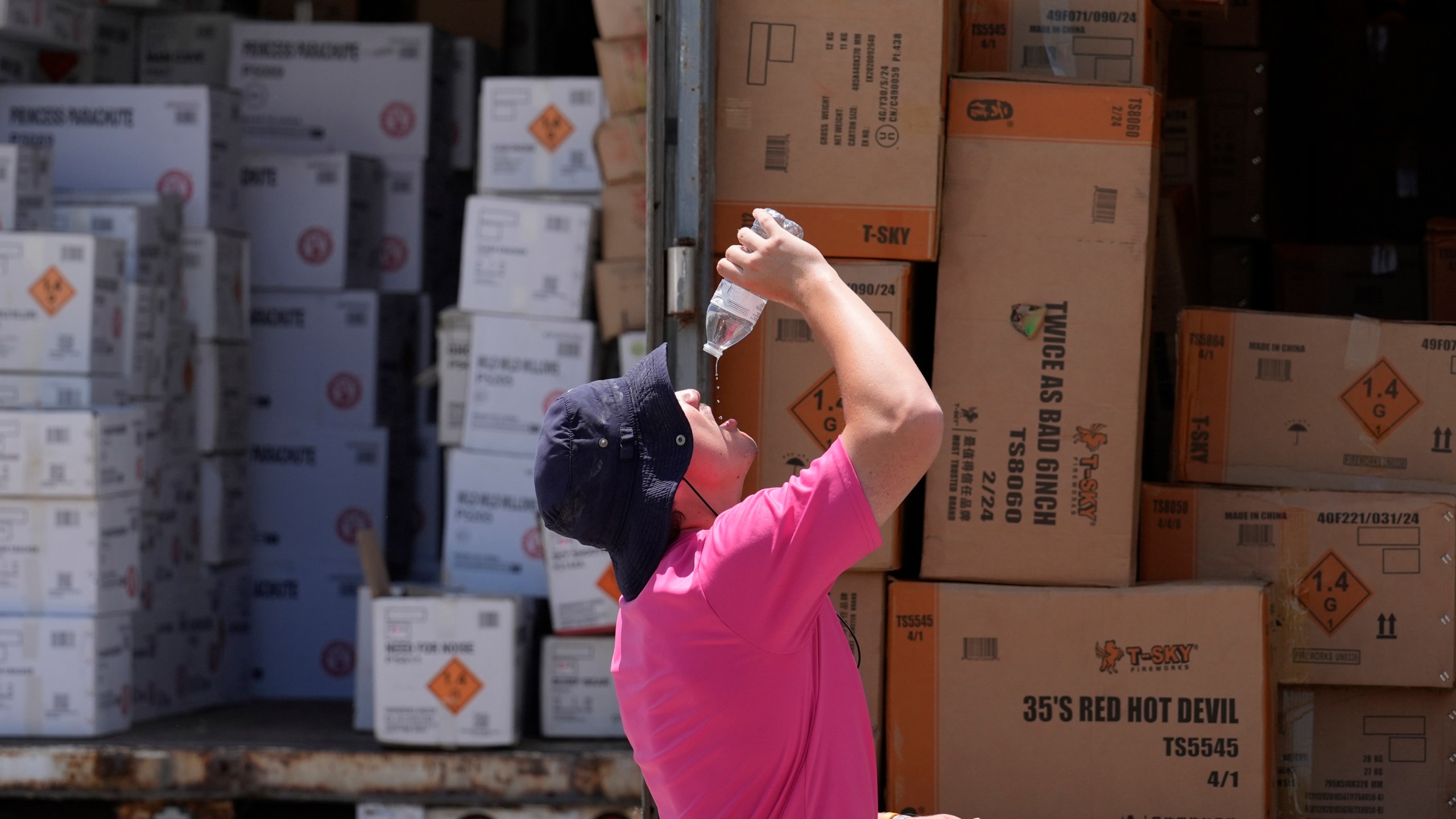 A man drinks water on Monday, June 17, 2024.