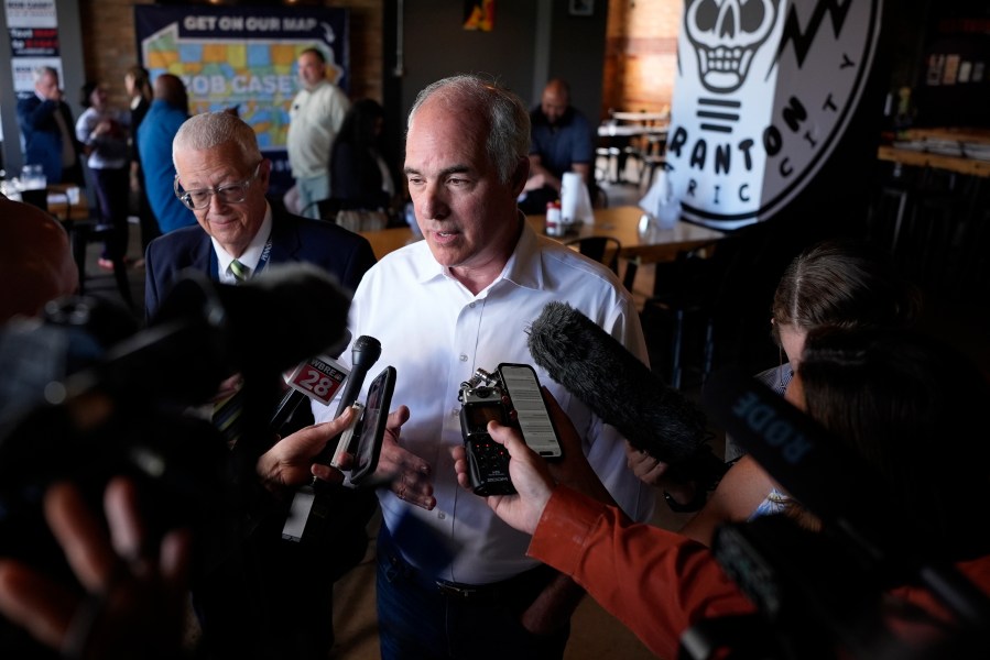 Sen. Bob Casey, D-Pa., speaks to reporters after a campaign event, Monday, July 1, 2024, in Scranton, Pa. (AP Photo/Matt Slocum)