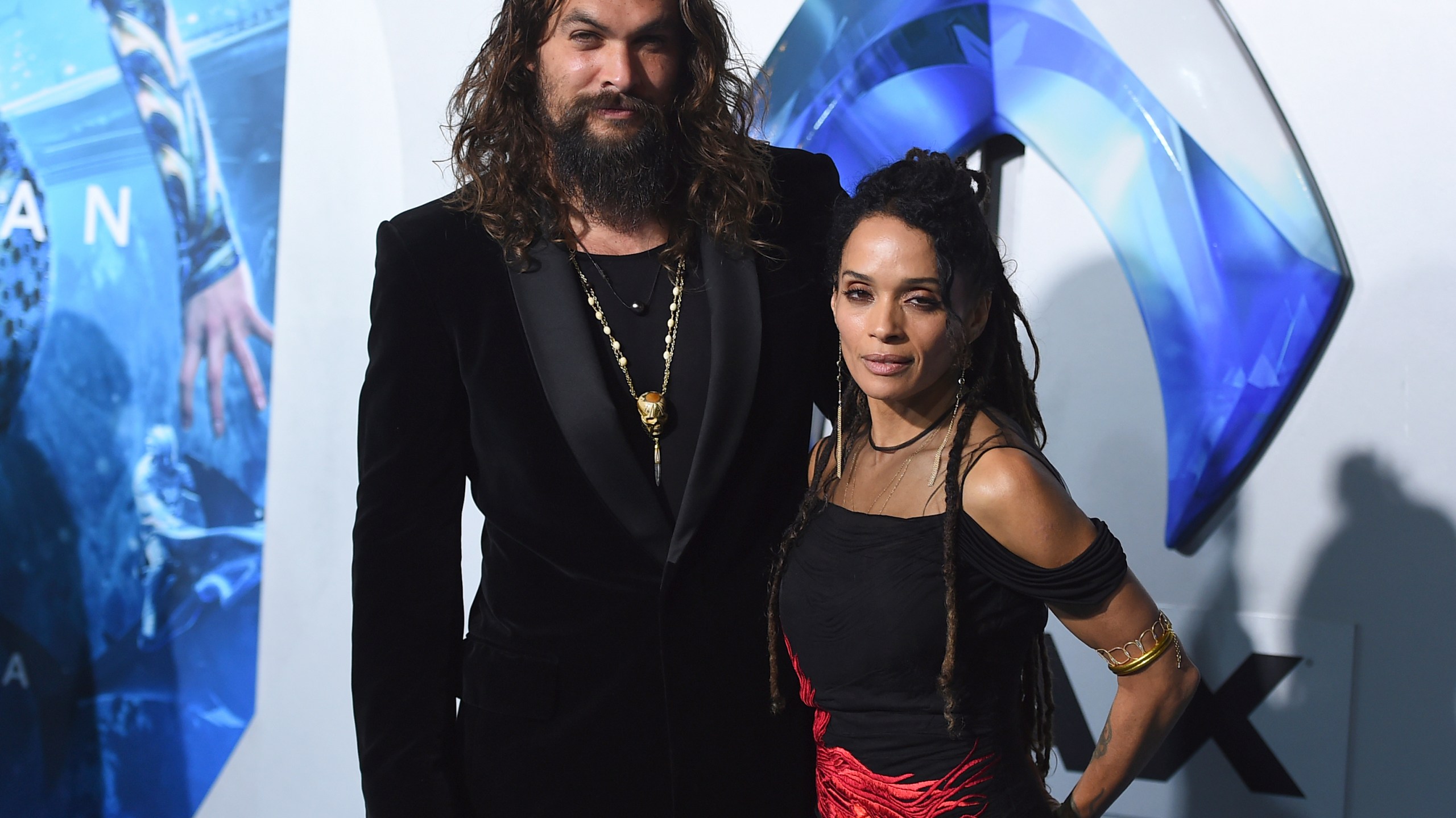FILE - Jason Momoa, left, and Lisa Bonet, right, arrive at the premiere of "Aquaman" at TCL Chinese Theatre, Dec. 12, 2018, in Los Angeles. On Monday, Jan. 8, 2024, Bonet filed for divorce from Momoa, 18 years after the two actors became a couple. (Photo by Jordan Strauss/Invision/AP, File)