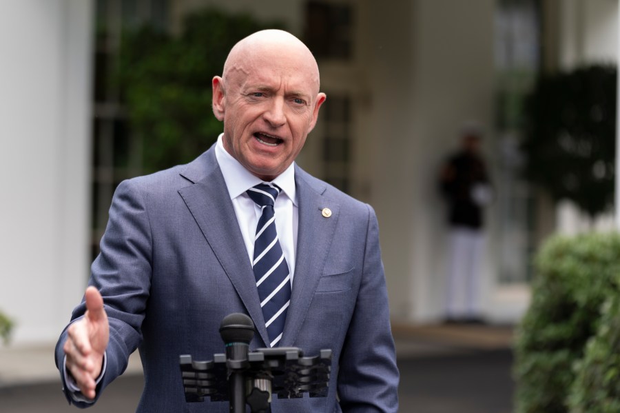 FILE - Sen. Mark Kelly, D-Ariz., speaks about the southern border outside the West Wing of the White House, Tuesday, June 4, 2024, in Washington. (AP Photo/Manuel Balce Ceneta, File)