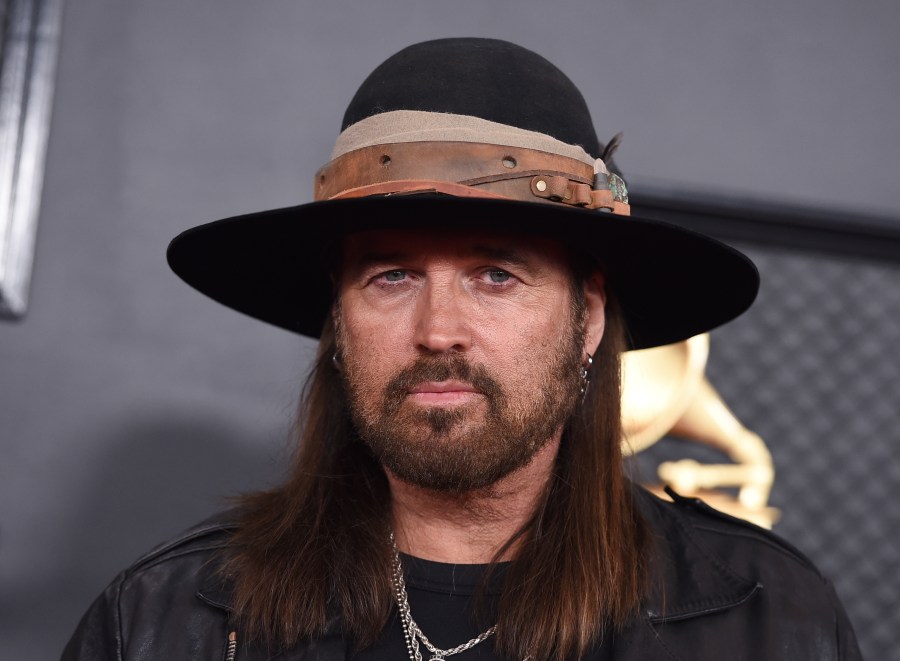 FILE - Billy Ray Cyrus arrives at the 62nd annual Grammy Awards in Los Angeles on Jan. 26, 2020. Cyrus and Firerose are now divorced. The dissolution of their seven-month marriage was finalized Monday by a Williamson County judge in Tennessee three months after Cyrus filed for divorce. (Photo by Jordan Strauss/Invision/AP, File)