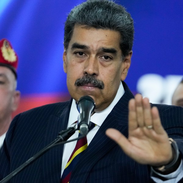 Venezuelan President Nicolas Maduro speaks to the press