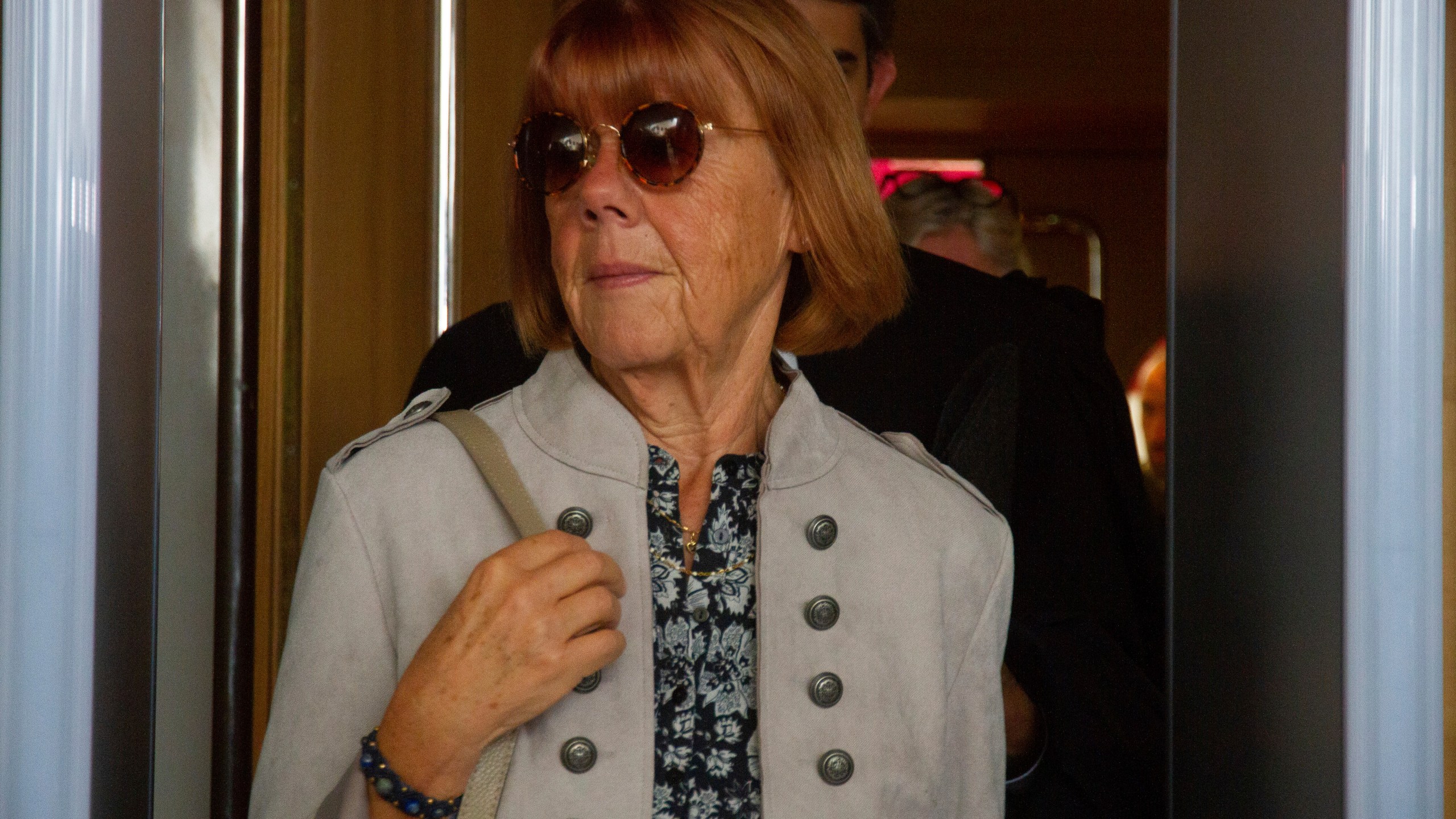 Gisele Pelicot exits the Avignon court house, in Avignon, southern France, Tuesday, Sept. 17, 2024, after her ex-husband admitted in court that for nearly a decade, he repeatedly drugged his unwitting wife and invited dozens of men to rape her while she lay unconscious. (AP Photo/Diane Jantet)