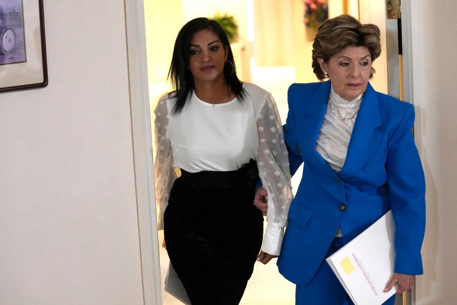 Attorney Gloria Allred, right, and Thalia Graves attend a press conference.