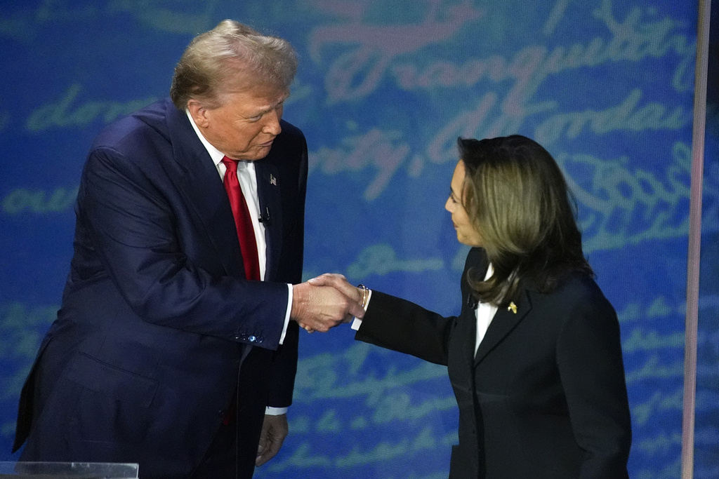 Donald Trump and Kamala Harris shake hands ahead of their presidential debate.
