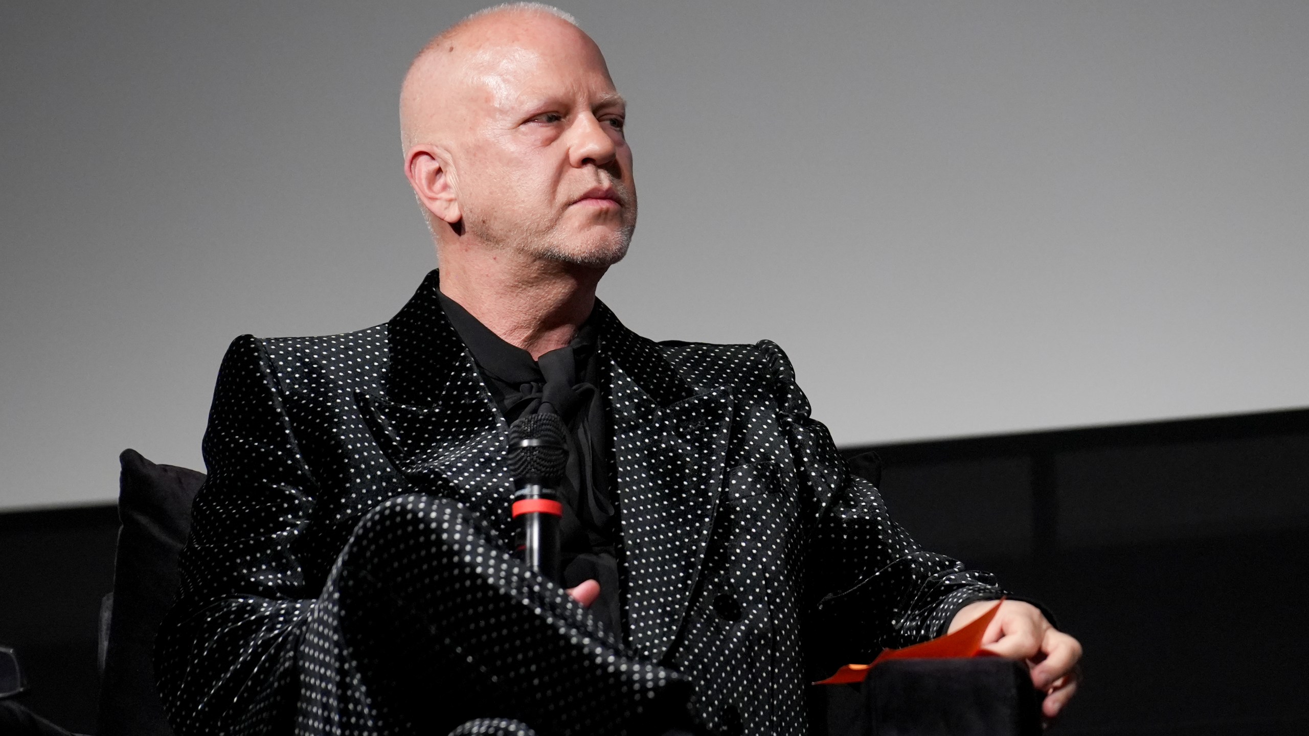 Ryan Murphy sits on a panel at the FYC red carpet event.