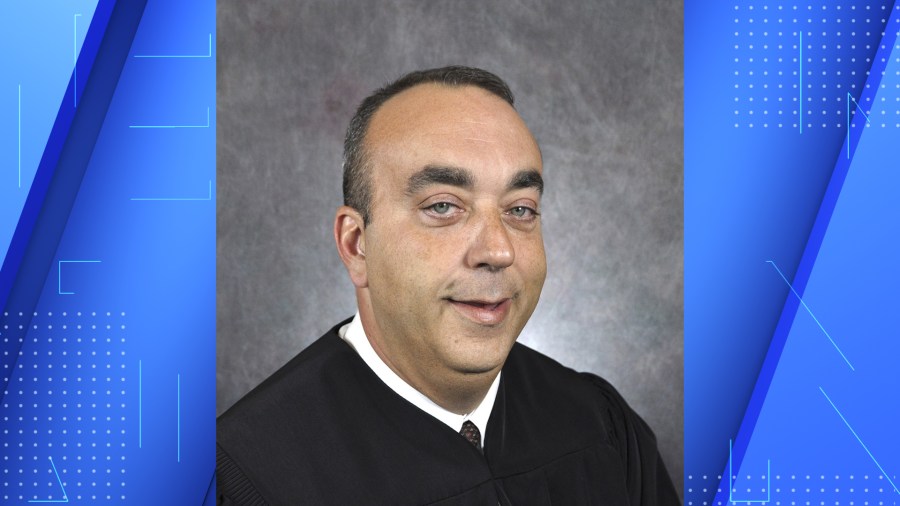 This undated photo provided by Kentucky Court of Justice shows slain District Judge Kevin Mullins.