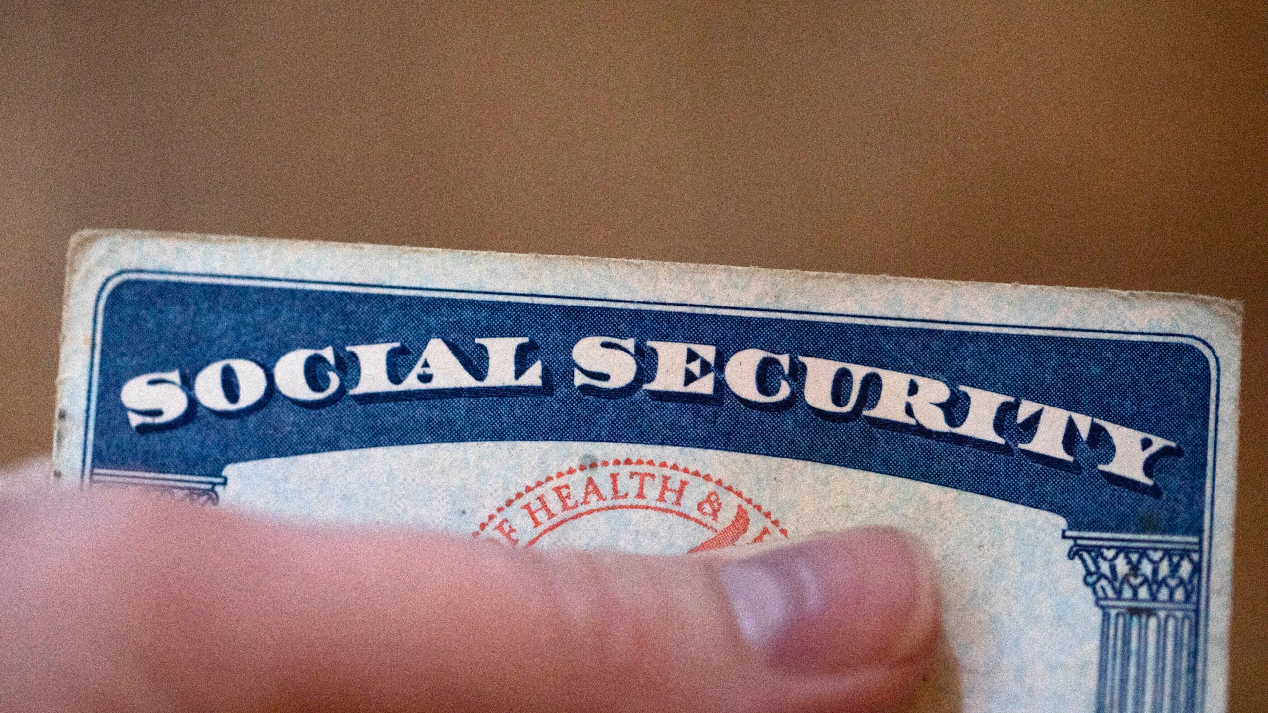 A Social Security card is displayed.