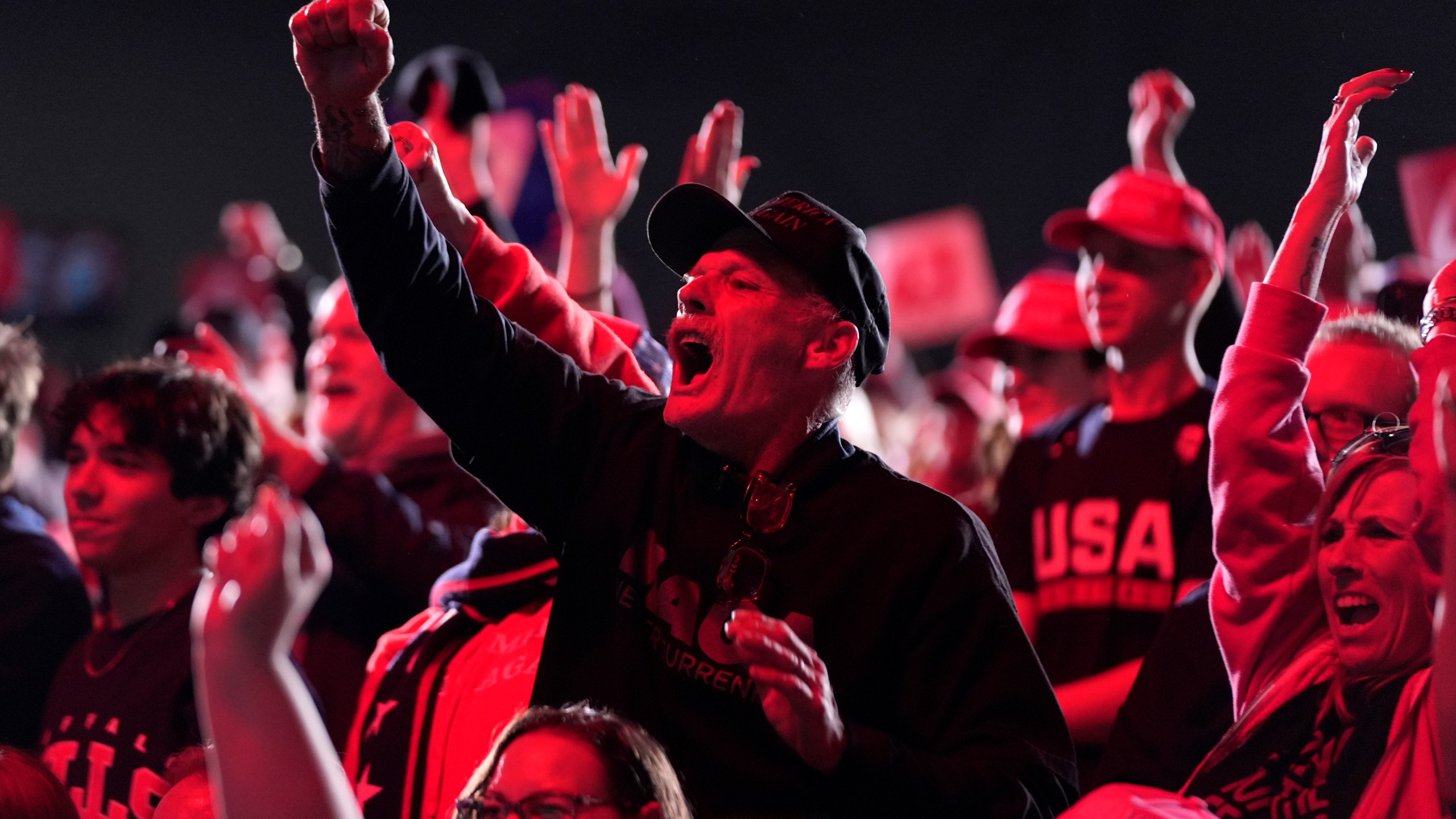 Attendees cheer as Republican presidential nominee former President Donald Trump speaks during a campaign rally at the Suburban Collection Showplace, Saturday, Oct. 26, 2024, in Novi, Mich. (AP Photo/Alex Brandon)