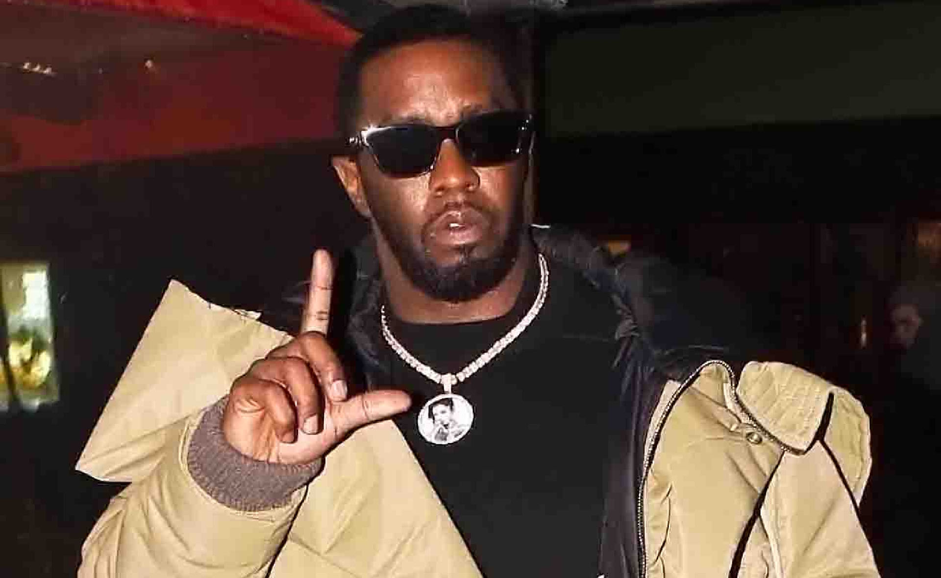 Diddy is pictured while arriving at an event
