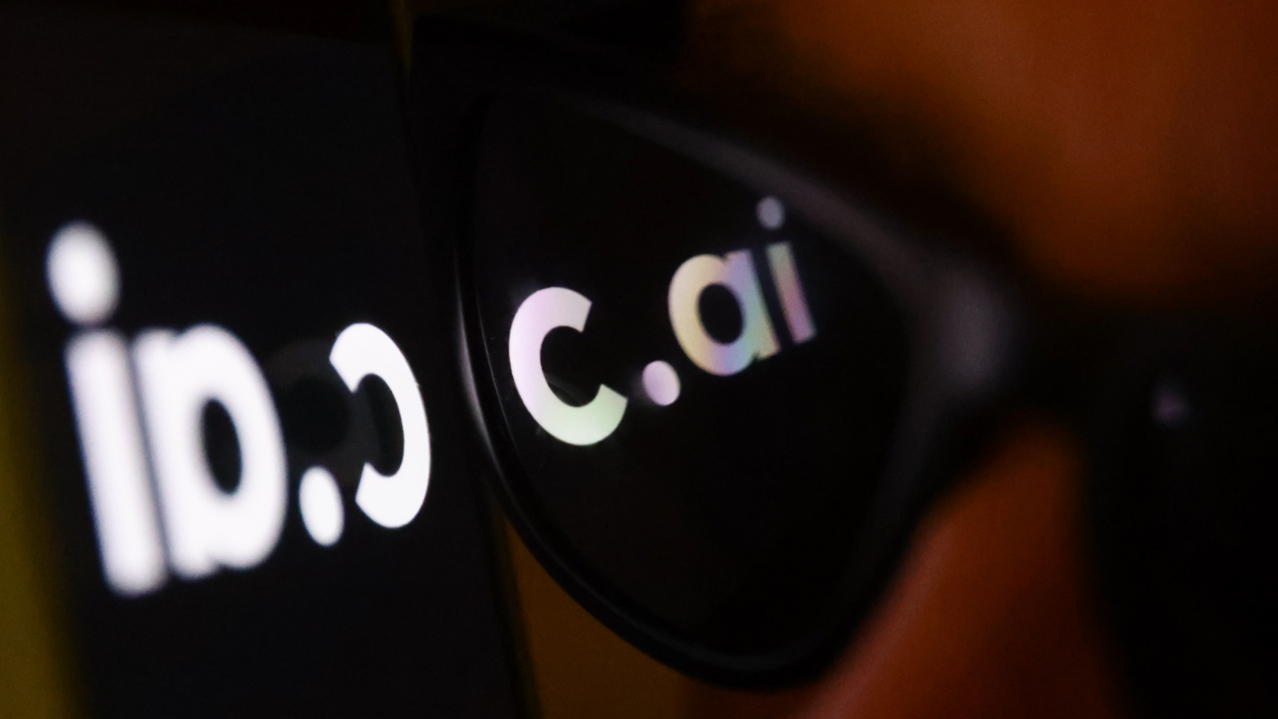 Character.ai logo displayed on a phone screen and reflected on sunglasses is seen in this illustration photo.