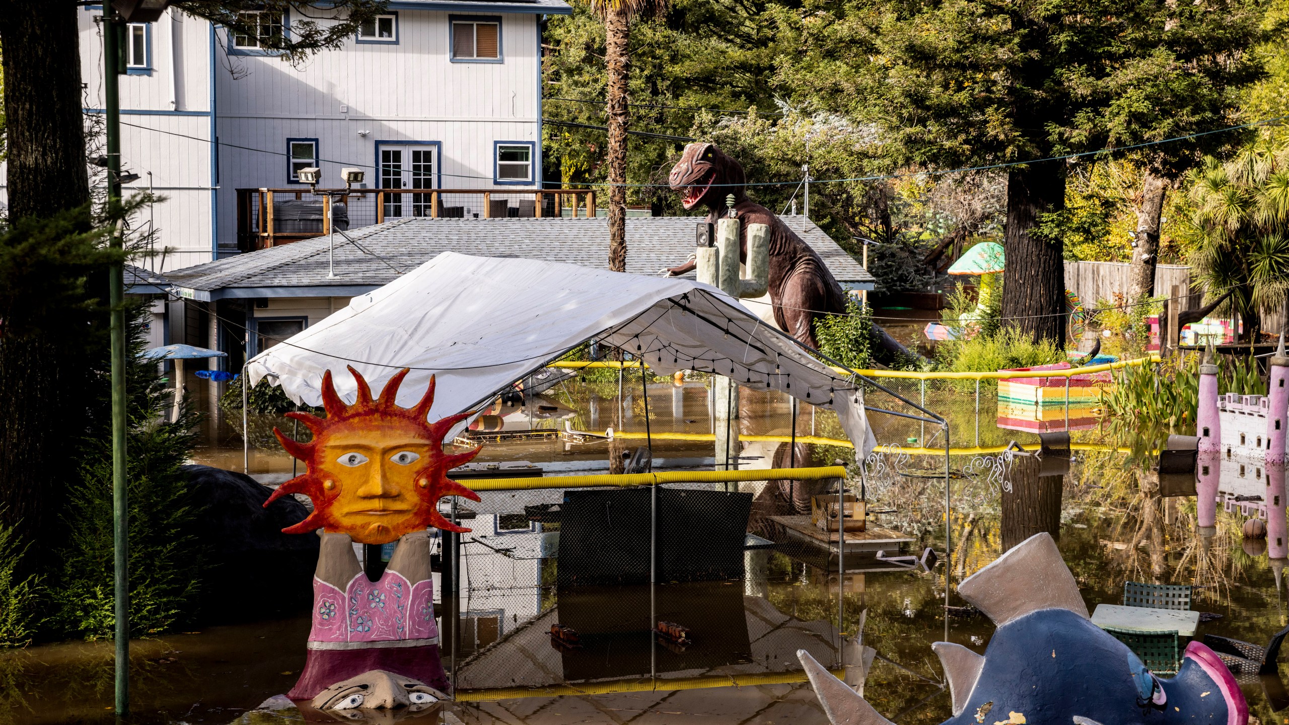 Floodwater surrounds Pee Wee Golf & Arcade after a major storm in Guerneville, Calif., Saturday, Nov. 23, 2024. (Stephen Lam/San Francisco Chronicle via AP)