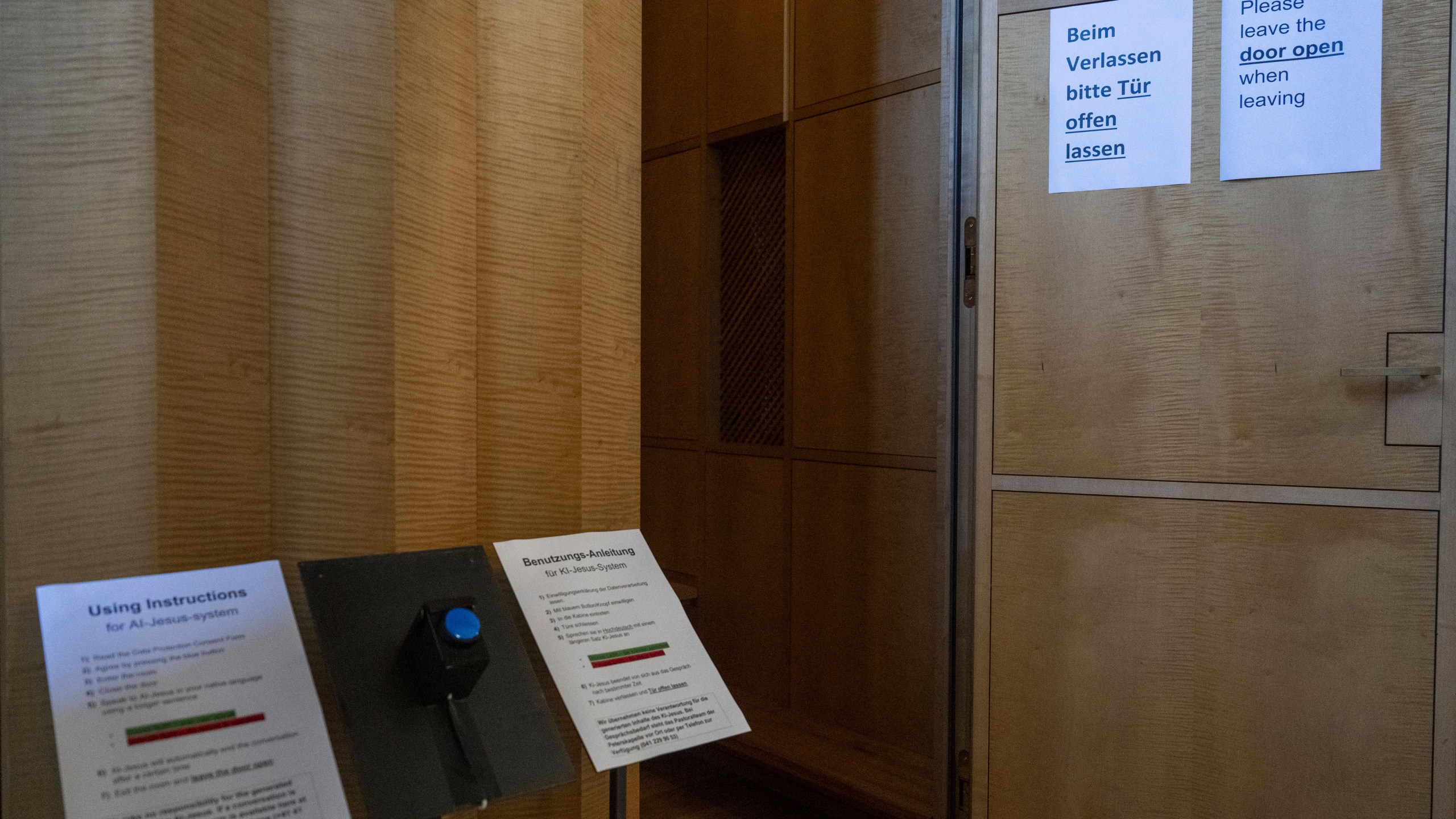 An experimental art installation with an AI Jesus entitled, Deus in Machina, installed in a confessional in St. Peter's Chapel in the old town of Lucerne, Switzerland, Sunday, Aug. 25, 2024. (Urs Flueeler/Keystone via AP)