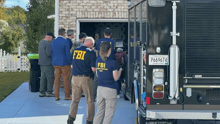 FBI agents searching a home.