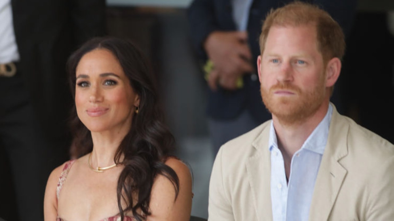 Meghan and Harry visiting an arts center