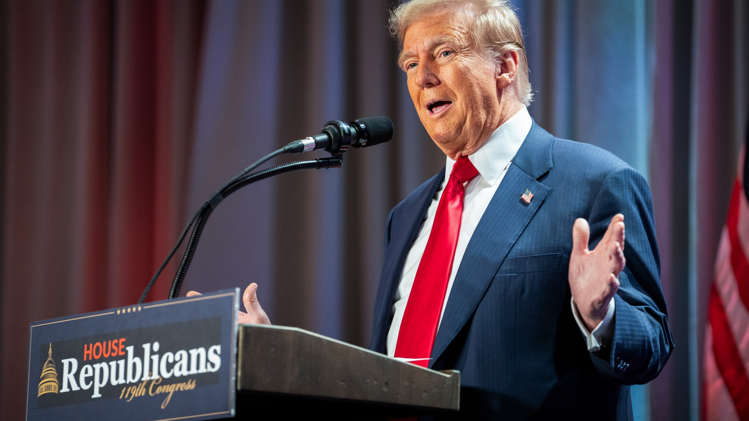 Donald Trump speaks at a press gathering.