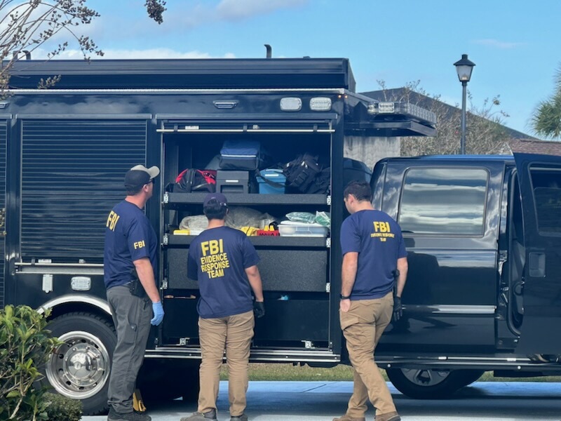 FBI agents at John-Paul Miller's home.