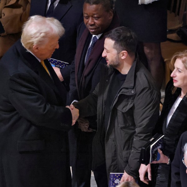 President-elect Donald Trump shakes hands with Ukraine's President Volodymyr Zelenskyy in Notre Dame Cathedral as France's iconic cathedral is formally reopening its doors for the first time since a devastating fire nearly destroyed the 861-year-old landmark in 2019, Saturday Dec.7, 2024 in Paris ( Ludovic Marin, Pool via AP)