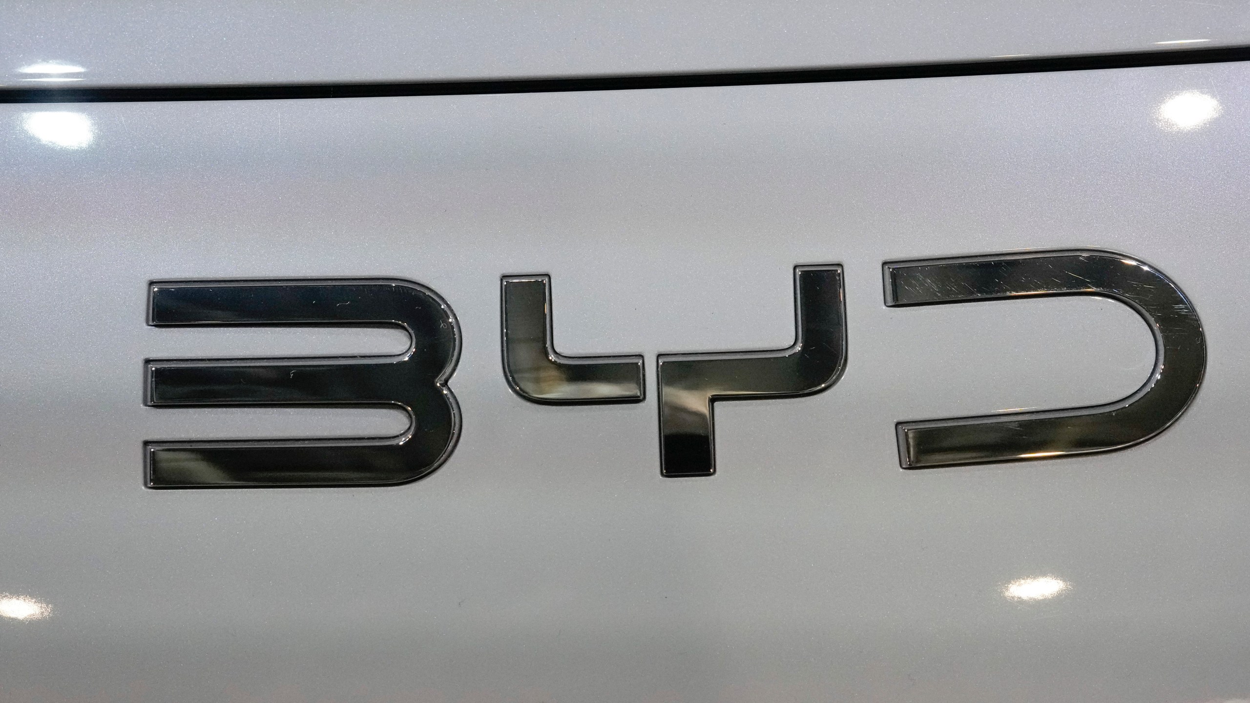 The BYD logo is photographed at the Paris Auto Show in Paris, Oct. 15, 2024.