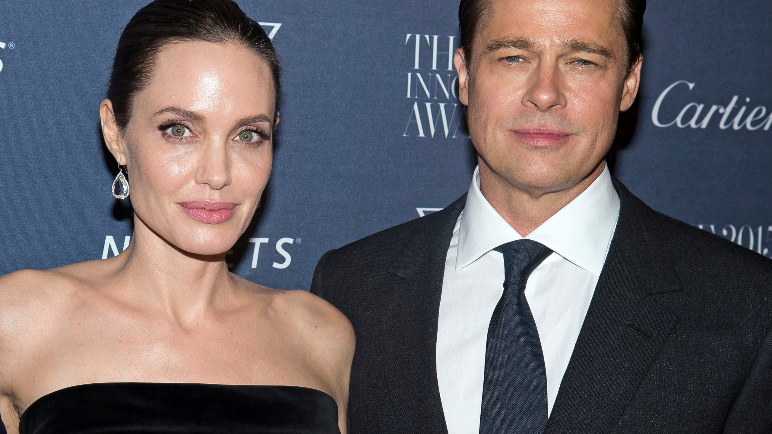 Angelina Jolie Pitt and Brad Pitt pose for a photo at the WSJ Magazine Innovator Awards 2015 at The Museum of Modern Art in New York, on Nov. 4, 2015. (Photo by Charles Sykes/Invision/AP, File)