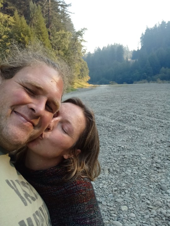 Zoe Penrod kissing David Boyett on the cheek