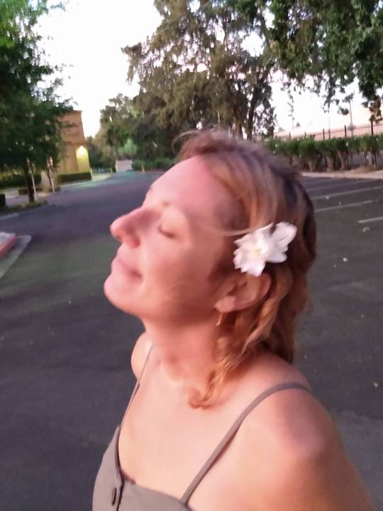 A woman with a flower in her hair