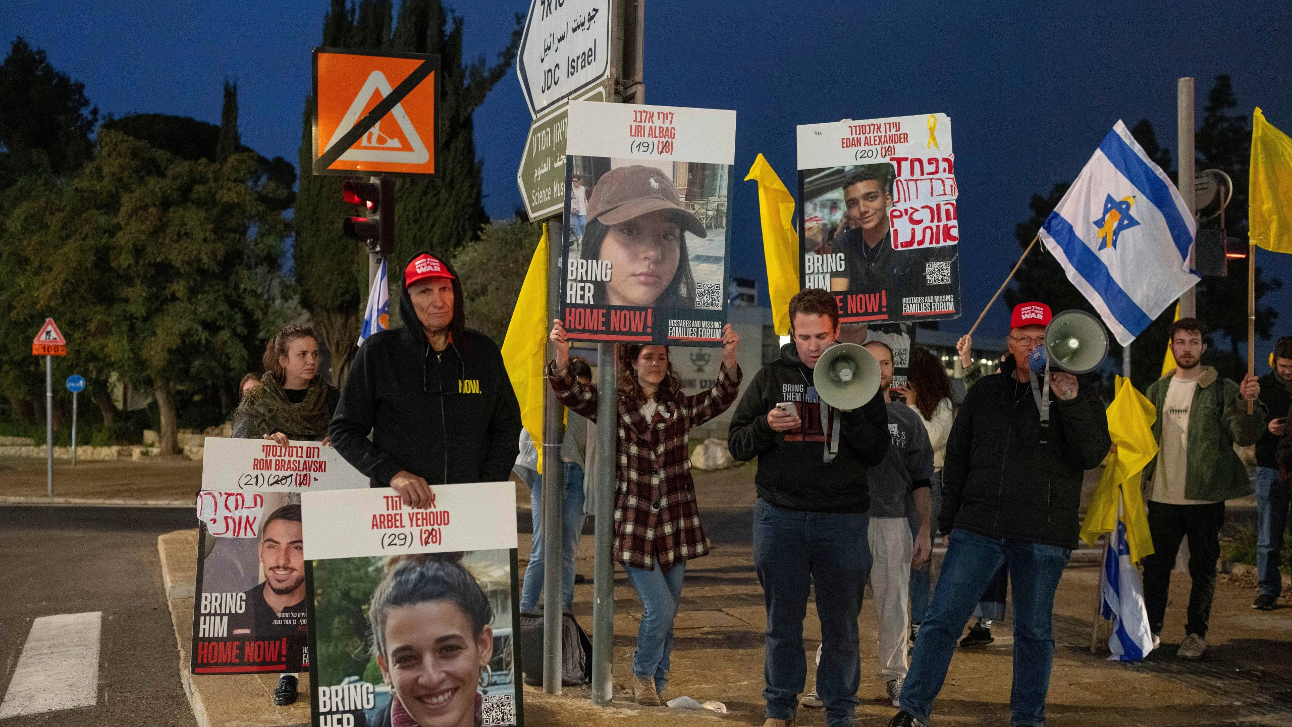 FILE - Israelis seeking the release of hostages in the Gaza Strip demonstrate outside the prime minister's office in Jerusalem on Jan. 5, 2025 (AP Photo/Ohad Zwigenberg, File)