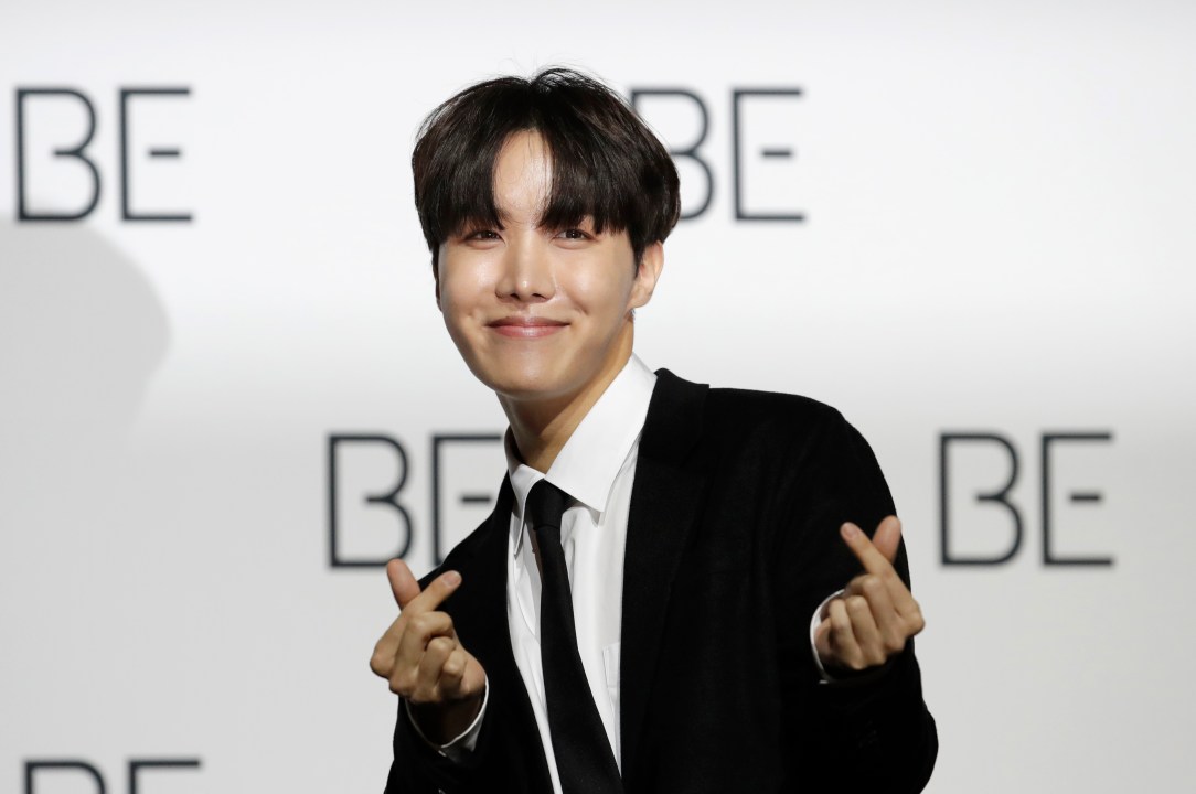 FILE - J-Hope, a member of South Korean K-pop band BTS poses for photographers during a press conference to introduce their new album "BE" in Seoul, South Korea, Nov. 20, 2020. (AP Photo/Lee Jin-man, File)