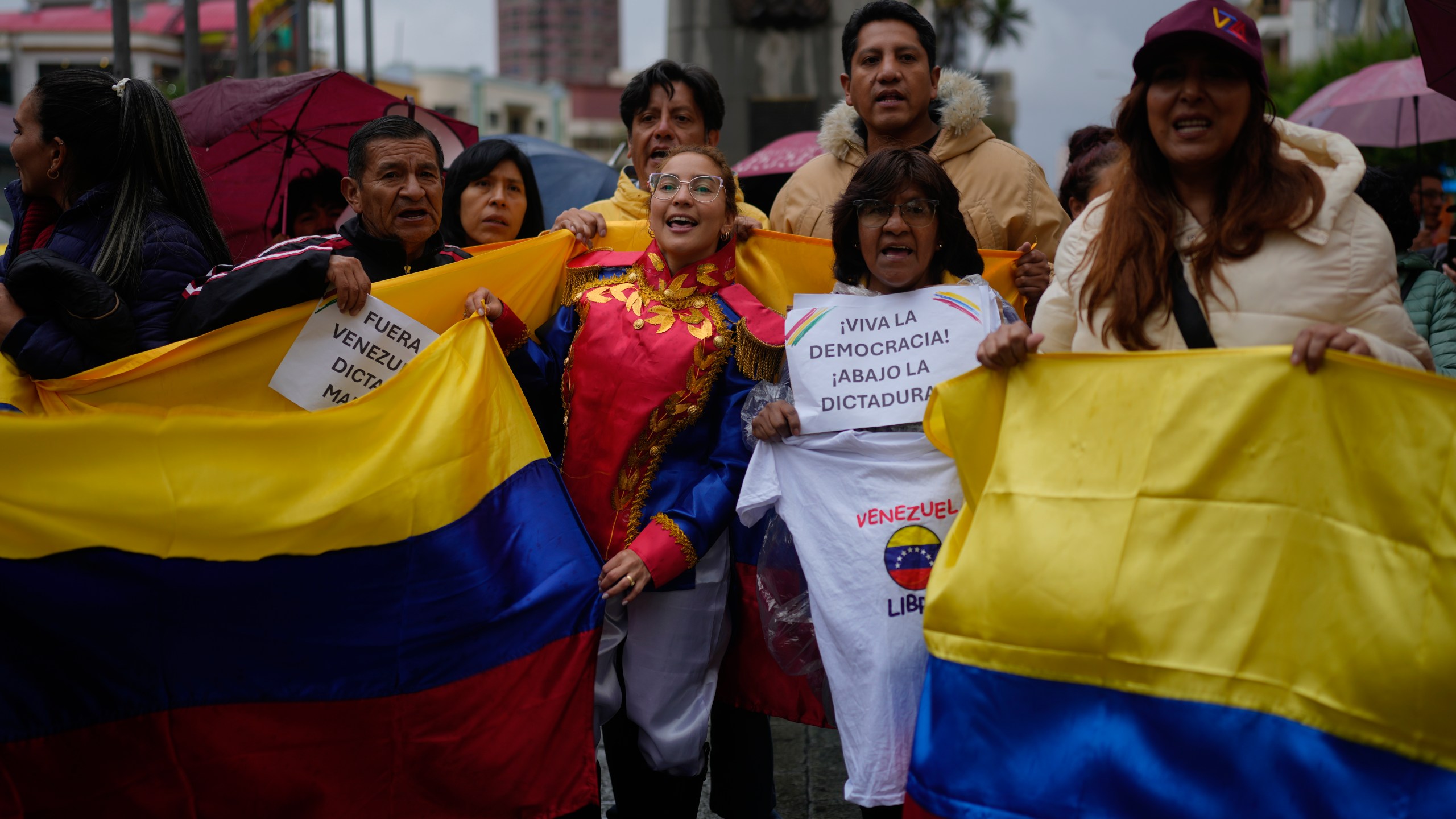 Opponents of Venezuelan President Nicolas Maduro participate in a protest the day before his inauguration for a third term, in La Paz, Bolivia, Thursday, Jan. 9, 2025. (AP Photo/Juan Karita)