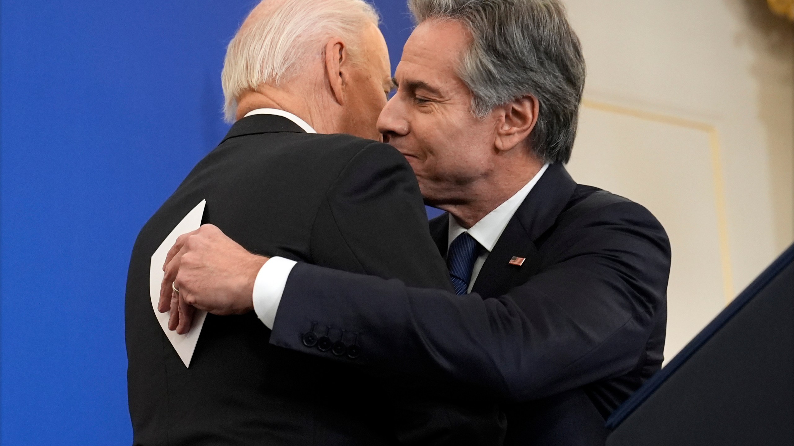 President Joe Biden hugs Secretary of State Antony Blinken before he speaks about foreign policy during a speech at the State Department in Washington, Monday, Jan. 13, 2025. (AP Photo/Susan Walsh)