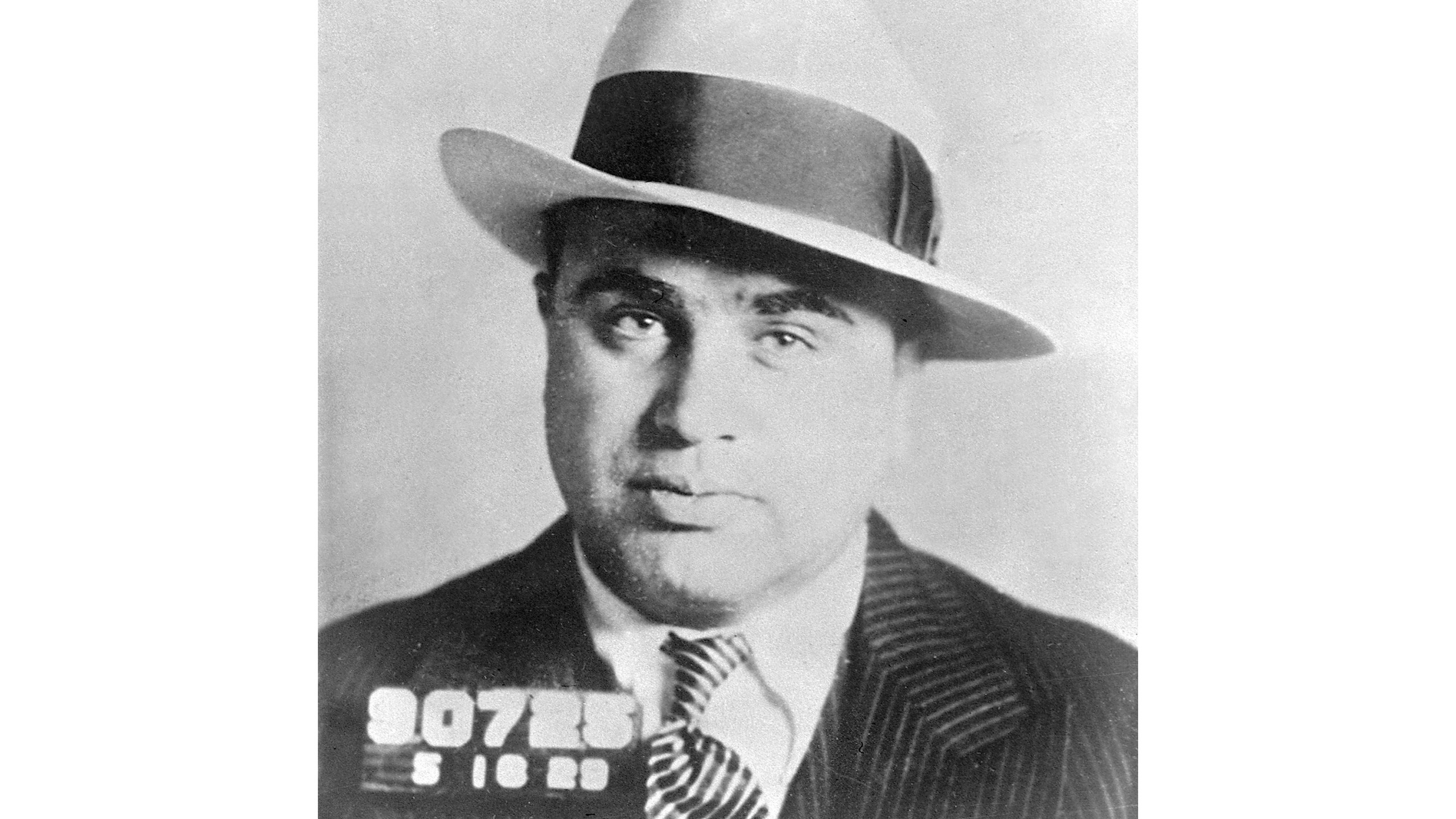 FILE - Chicago gangster Al Capone has his photo taken while in custody in Philadelphia, May 18, 1929, on charges of carrying concealed weapons. (AP Photo, File)
