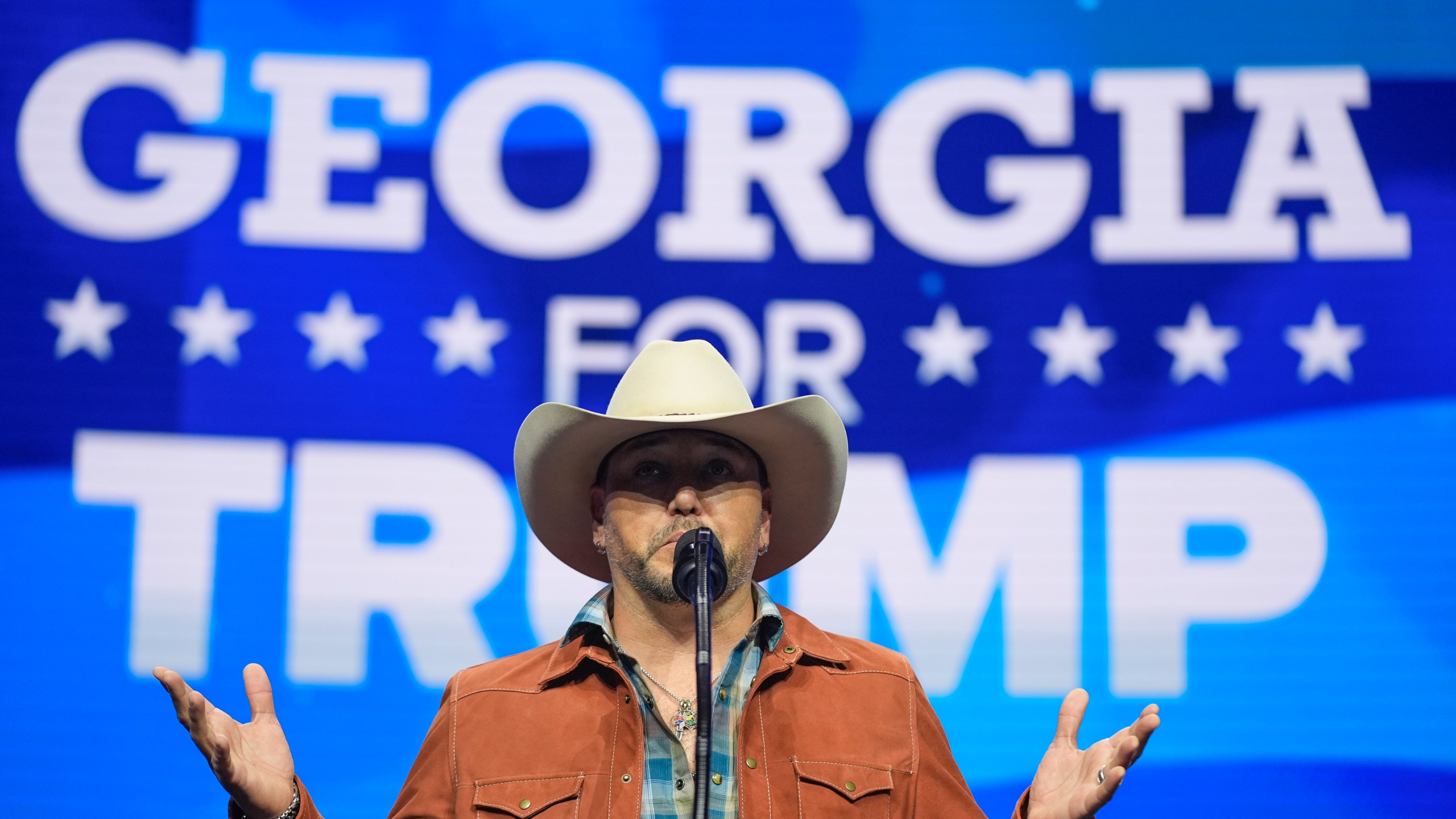 FILE - Country music singer Jason Aldean speaks before Republican presidential nominee former President Donald Trump at a Turning Point Action campaign rally, Oct. 23, 2024, in Duluth, Ga. (AP Photo/Alex Brandon, File)
