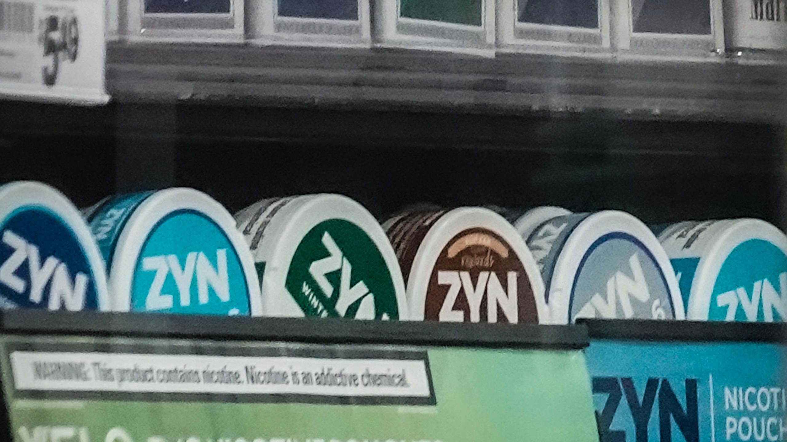 FILE - Containers of Zyn, a smokeless nicotine pouch, are displayed for sale among other nicotine and tobacco products at a newsstand on Feb. 23, 2024, in New York. (AP Photo/Bebeto Matthews, File)