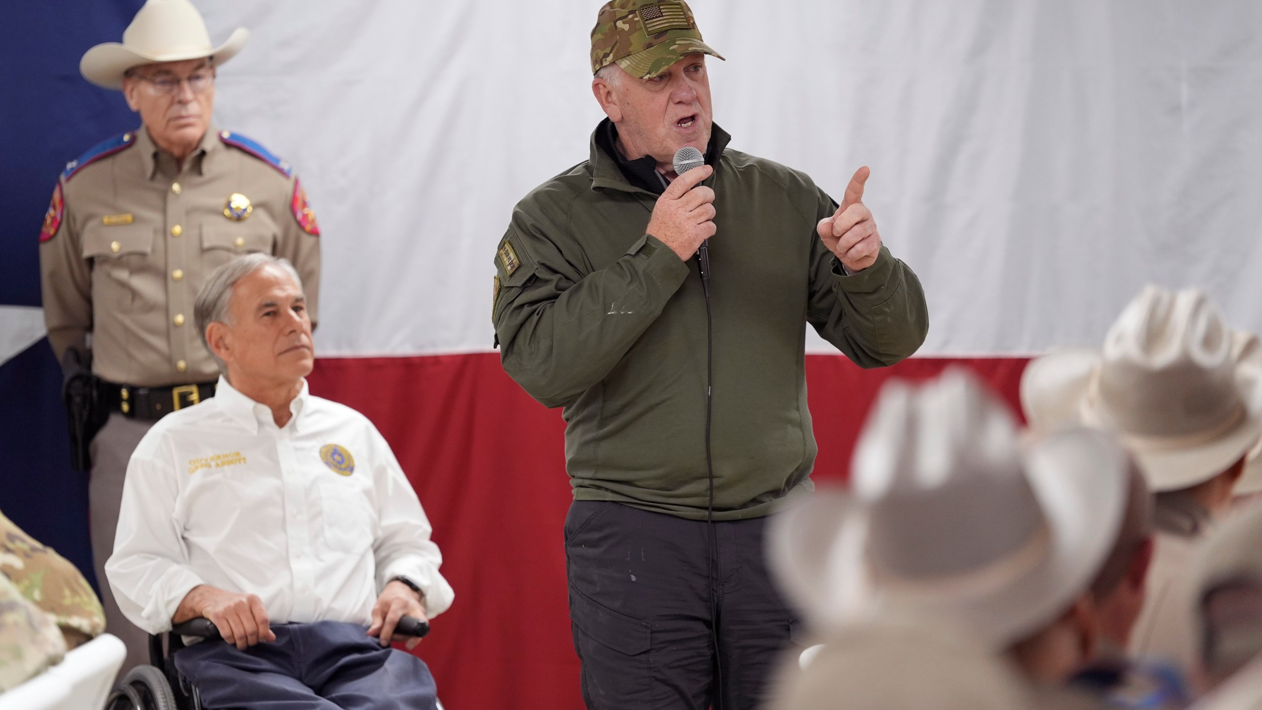 FILE - Incoming U.S. Border Czar Tom Homan, speaks to state troopers and national guardsmen, accompanied by Texas Gov. Greg Abbott, at a facility on the U.S.-Mexico border, in Eagle Pass, Texas, Nov. 26, 2024. (AP Photo/Eric Gay, File)