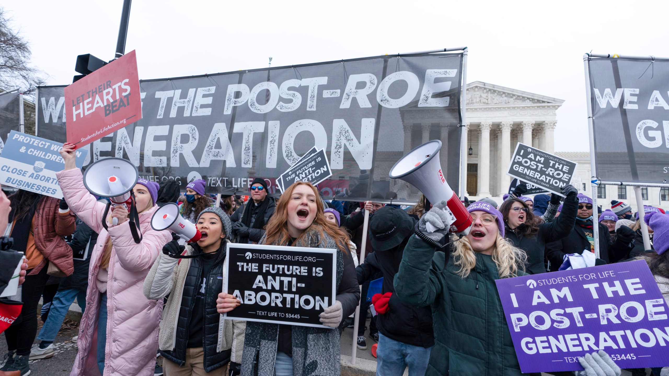 FILE - Anti-abortion activists march outside of the U.S. Supreme Court during the annual March for Life in Washington, Friday, Jan. 21, 2022. (AP Photo/Jose Luis Magana, File)