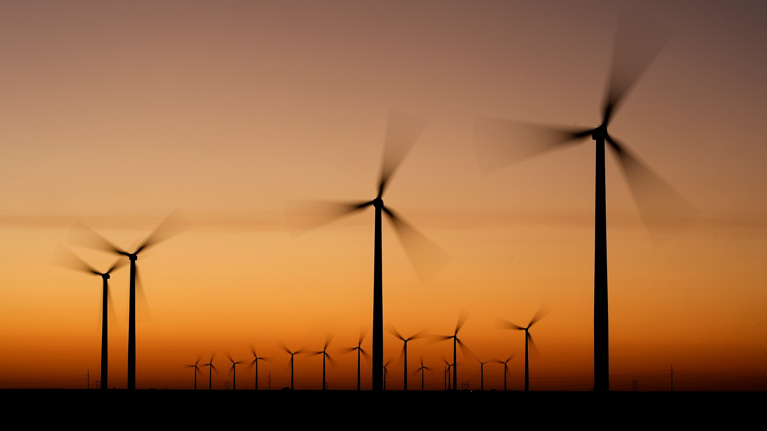 FILE - Wind turbines stretch across the horizon at dusk at the Spearville Wind Farm, Sept. 29, 2024, near Spearville, Kan. (AP Photo/Charlie Riedel, File)