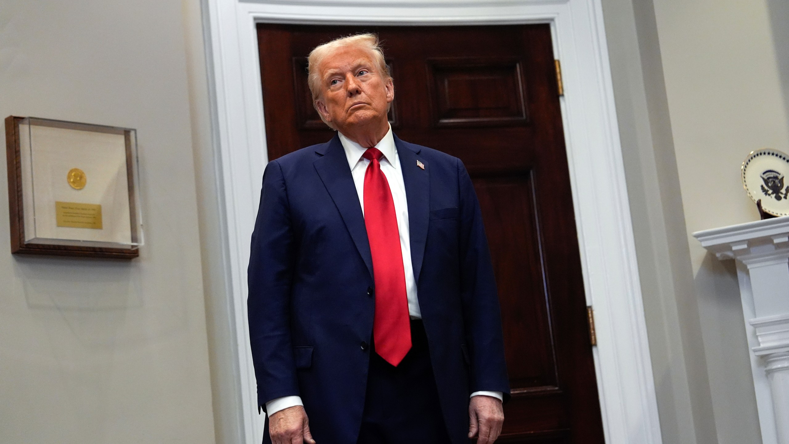 President Donald Trump listens in the Roosevelt Room at the White House, Tuesday, Jan. 21, 2025, in Washington. (AP Photo/Julia Demaree Nikhinson)