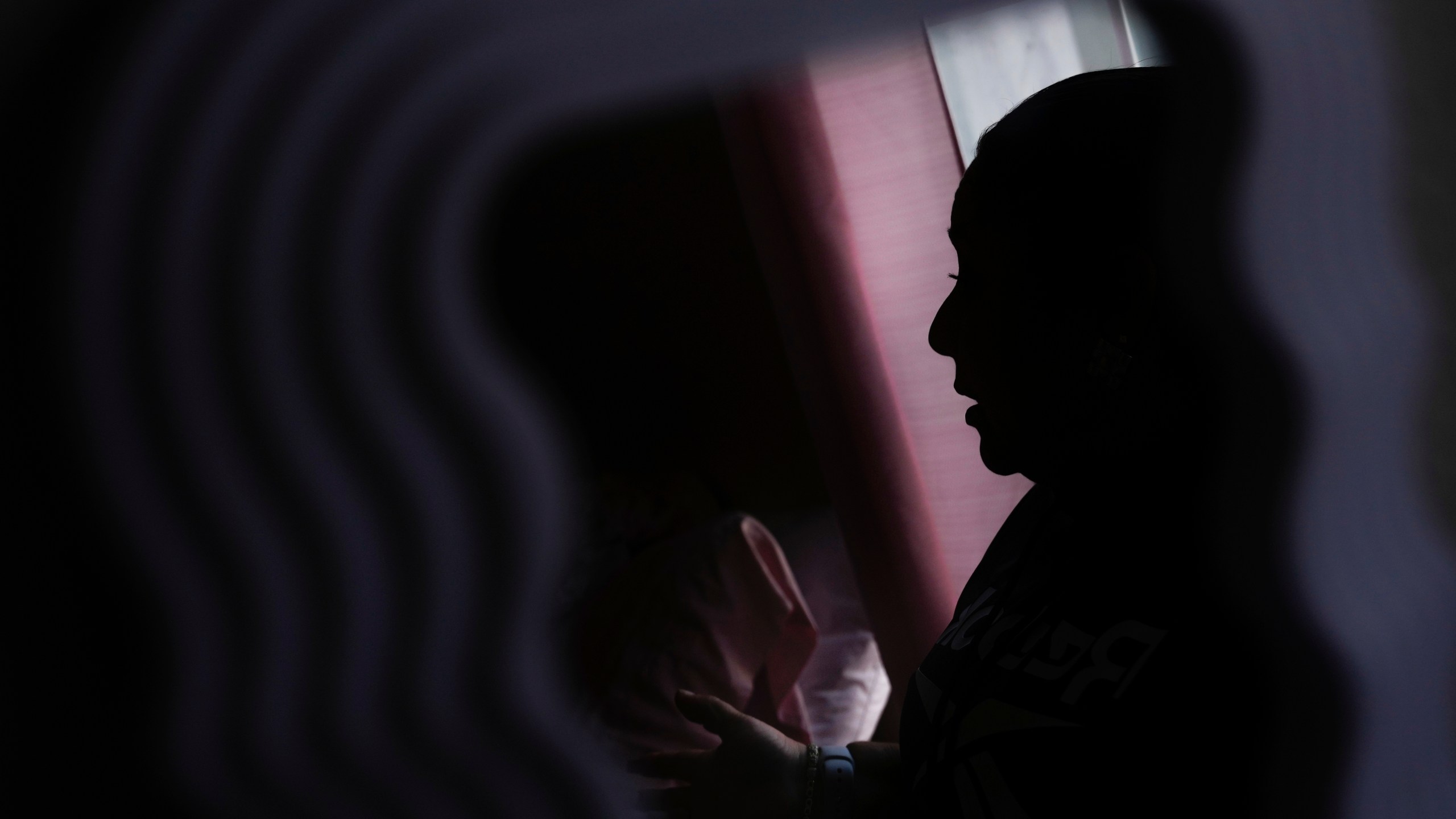 Carmen, who only shared her first name out of fear she could be targeted by immigration officials, is photographed at her apartment Wednesday, Jan. 22, 2025, in the San Francisco Bay Area. (AP Photo/Godofredo A. Vásquez)