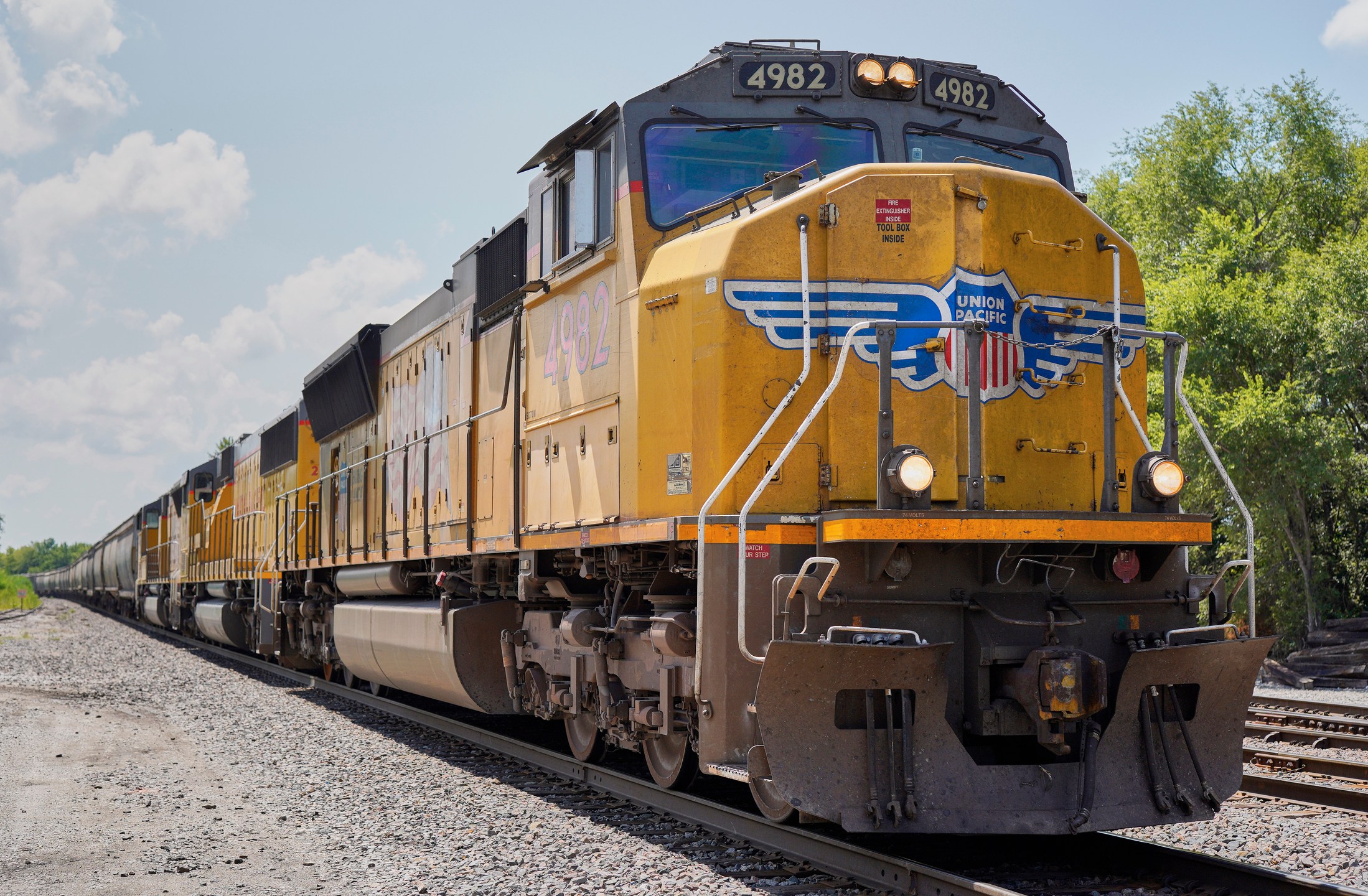 a Union Pacific train travels on tracks