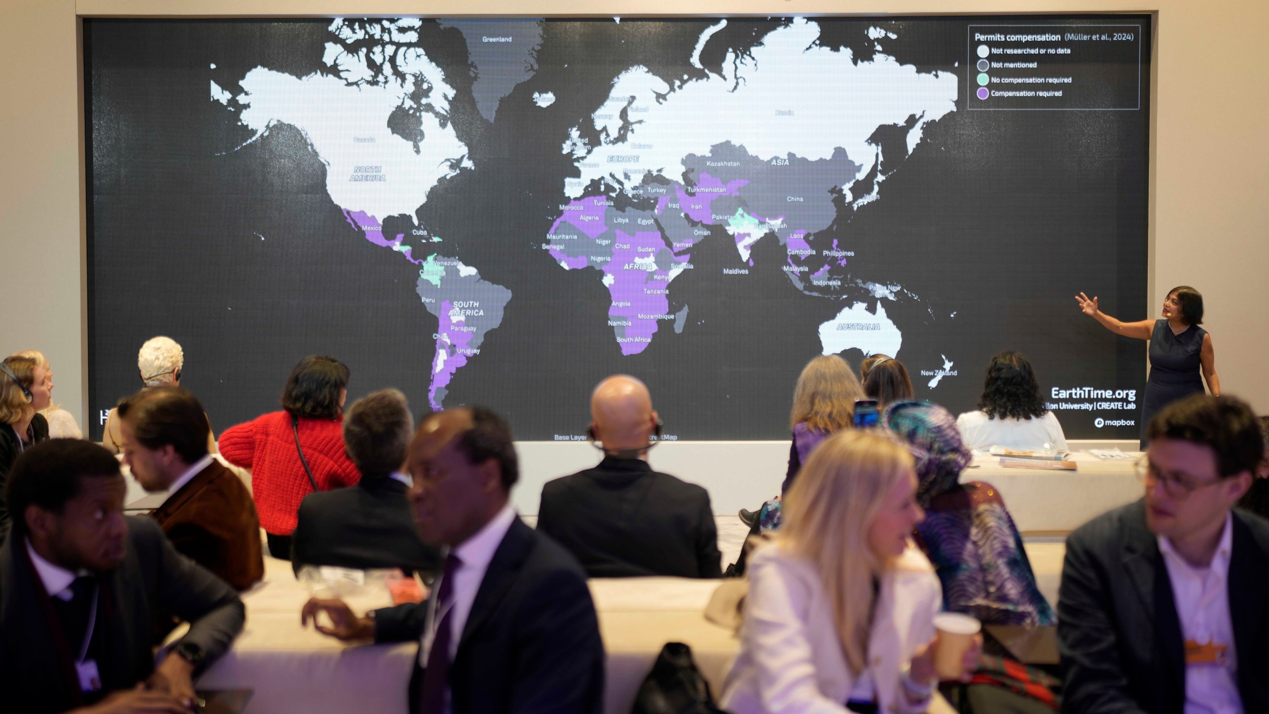 People attend the Global Situation Space session at the Annual Meeting of World Economic Forum in Davos, Switzerland, Thursday, Jan. 23, 2025. (AP Photo/Markus Schreiber)