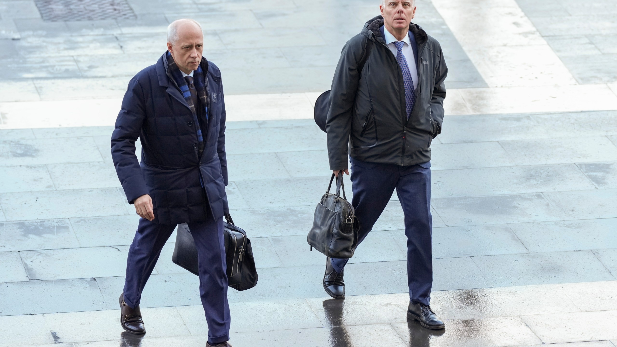 Amanda Knox lawyers Luca Luparia Donati, left, and Carlo Dalla Vedova arrive at the first section of the Supreme Court in Rome, in Rome, Thursday, Jan. 23, 2025. (AP Photo/Andrew Medichini)