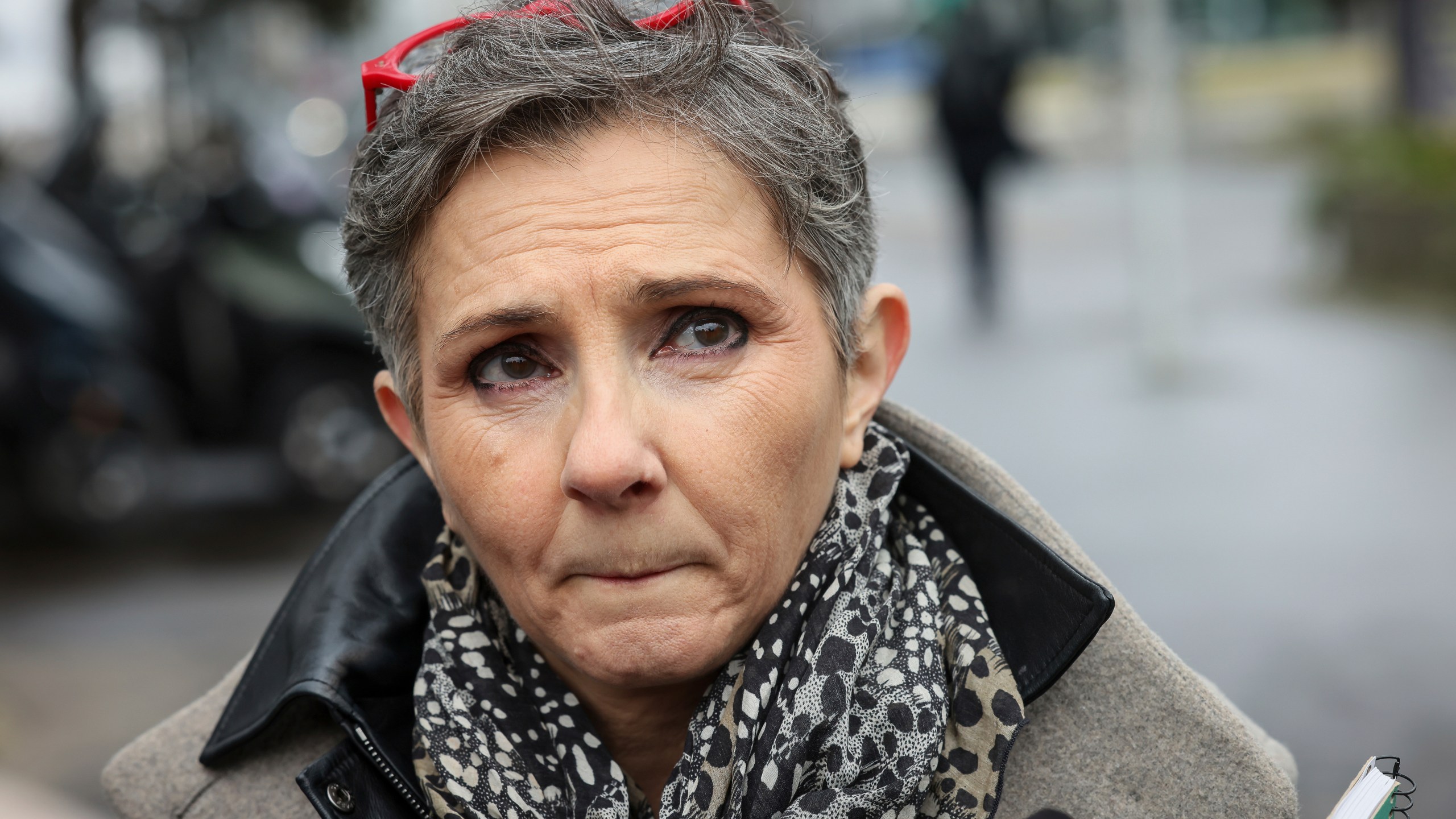 Dominique Pelicot 's lawyer Beatrice Zavarro answers reporters outside the Nanterre courthouse where the convicted rapist who horrified France by drugging his then wife, Gisele Pélicot, so other men could rape her, is now caught up in other cases, Thursday, Jan. 30, 2025 in Nanterre, outside Paris. (AP Photo/Thomas Padilla)