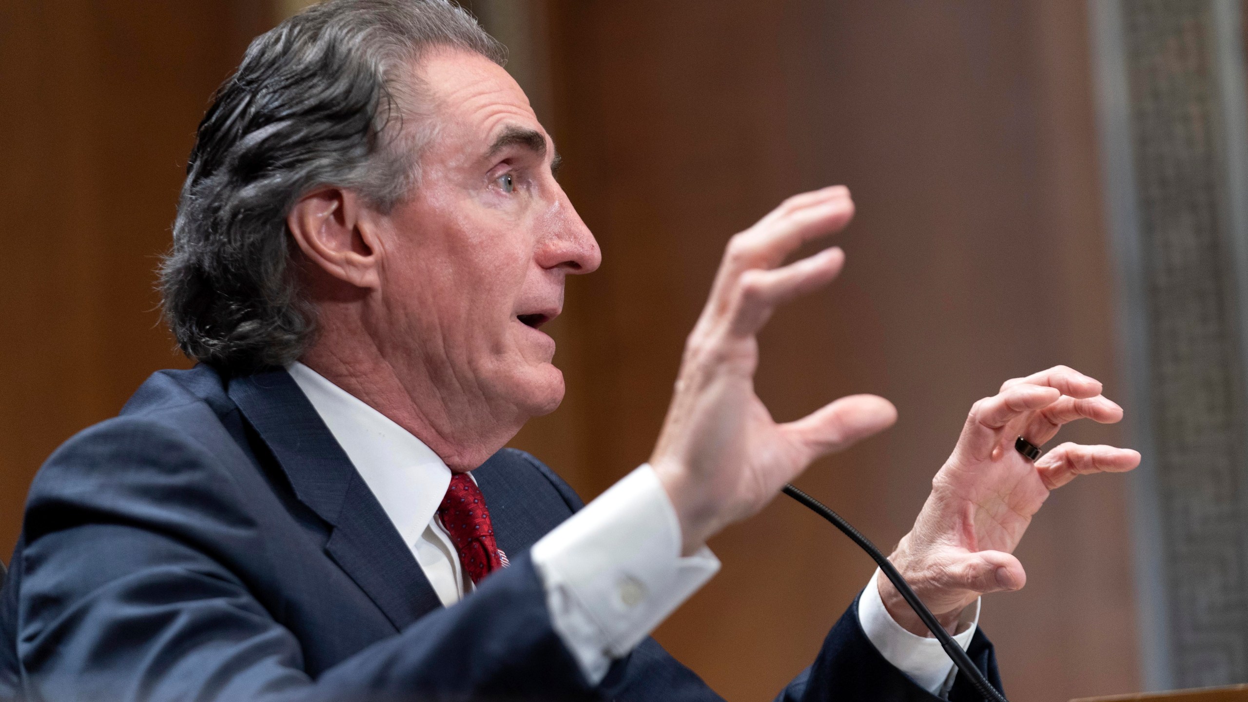 Former Gov. Doug Burgum, President-elect Donald Trump's choice to lead the the Interior Department as Secretary of the Interior, testifies before the Senate Energy and Natural Resources Committee on Capitol Hill in Washington, Thursday, Jan. 16, 2025. (AP Photo/Jose Luis Magana)