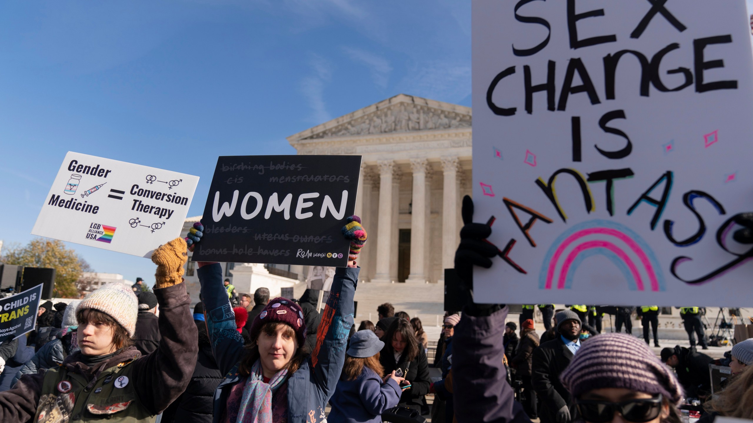 FILE - Demonstrators against transgenders rights protest during a rally outside of the Supreme Court, Wednesday, Dec. 4, 2024, in Washington, as arguments begin in a case regarding a Tennessee law banning gender-affirming medical care for transgender youth. (AP Photo/Jose Luis Magana, File)