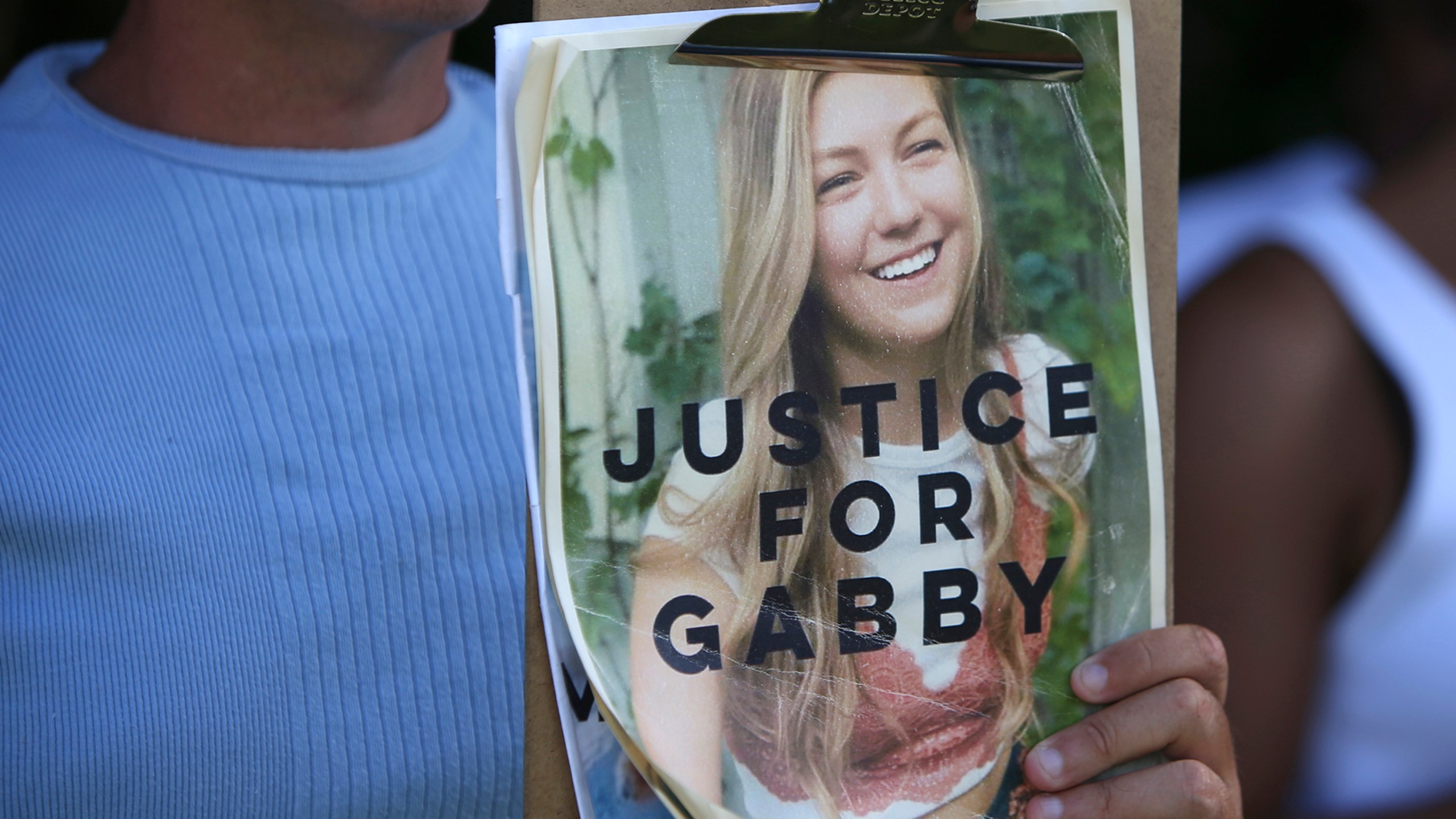 A photo of Gabby Petito with the words JUSTICE FOR GABBY