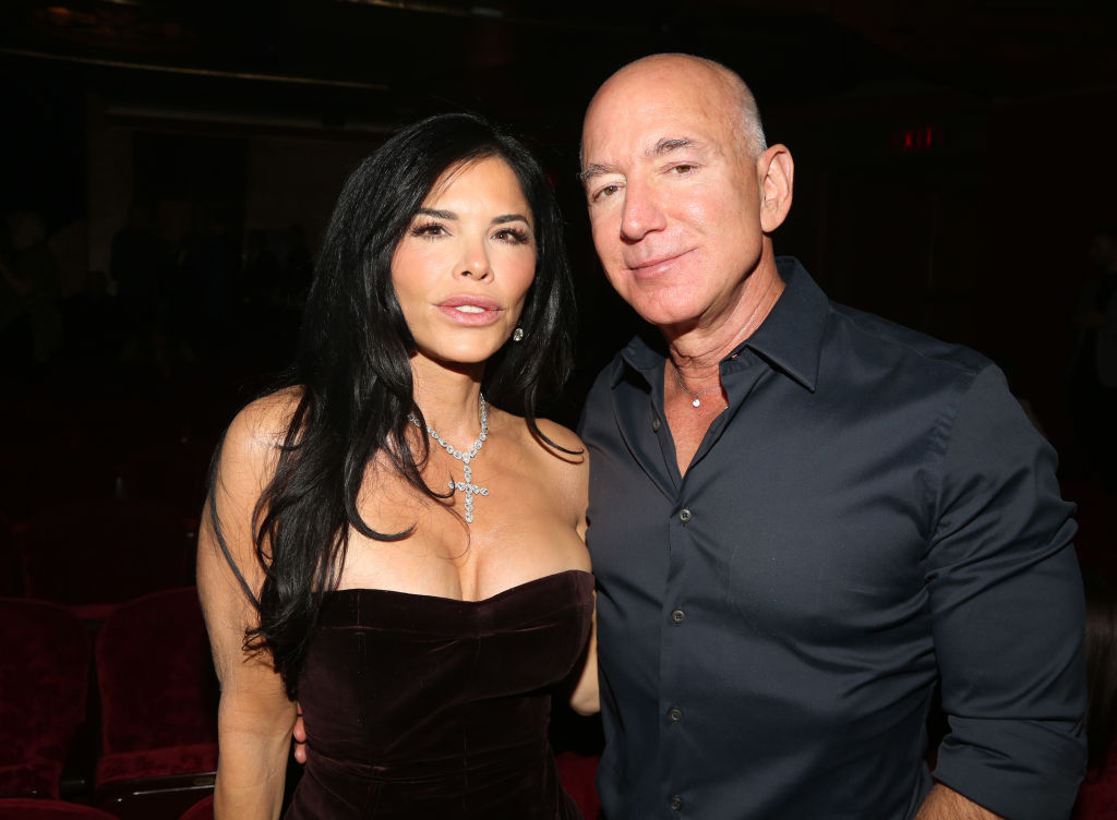 Lauren Sanchez and Jeff Bezos pose for a photo