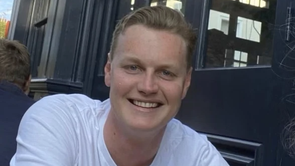 Chelsea, London, native Edward Pettifer smiles in a photo.