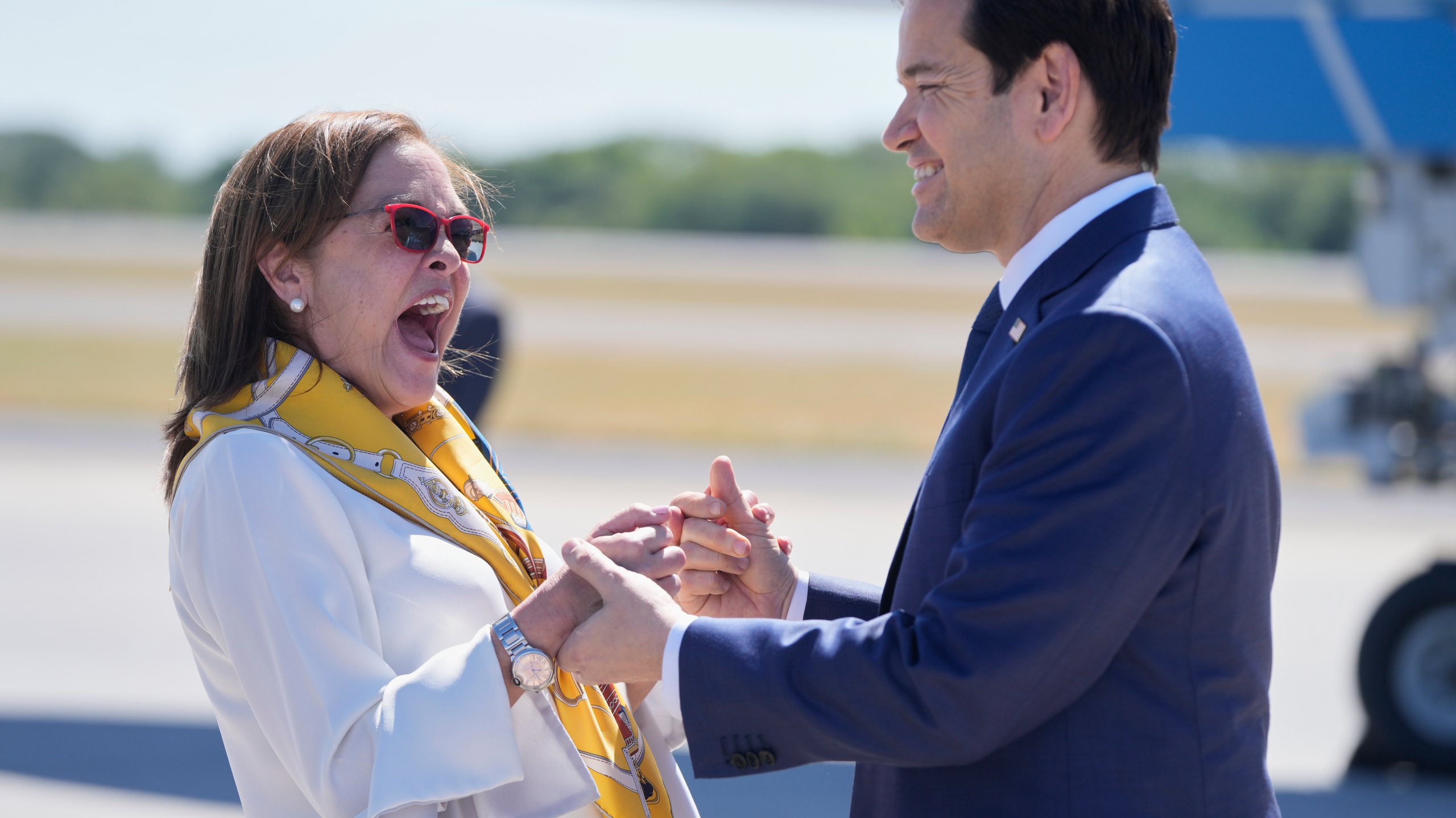 El Salvador's Foreign Minister Alexandra Hill Tinoco, left, welcomes U.S. Secretary of State Marco Rubio.