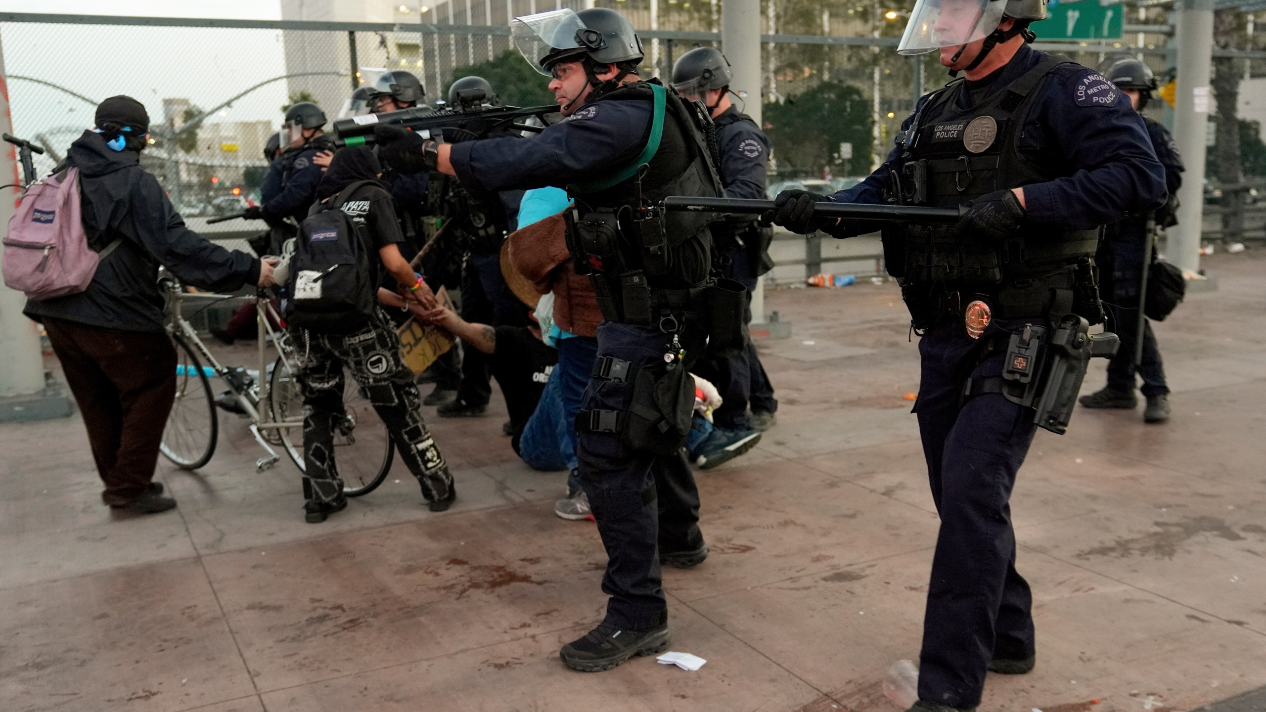 Police face off with demonstrators during a protest